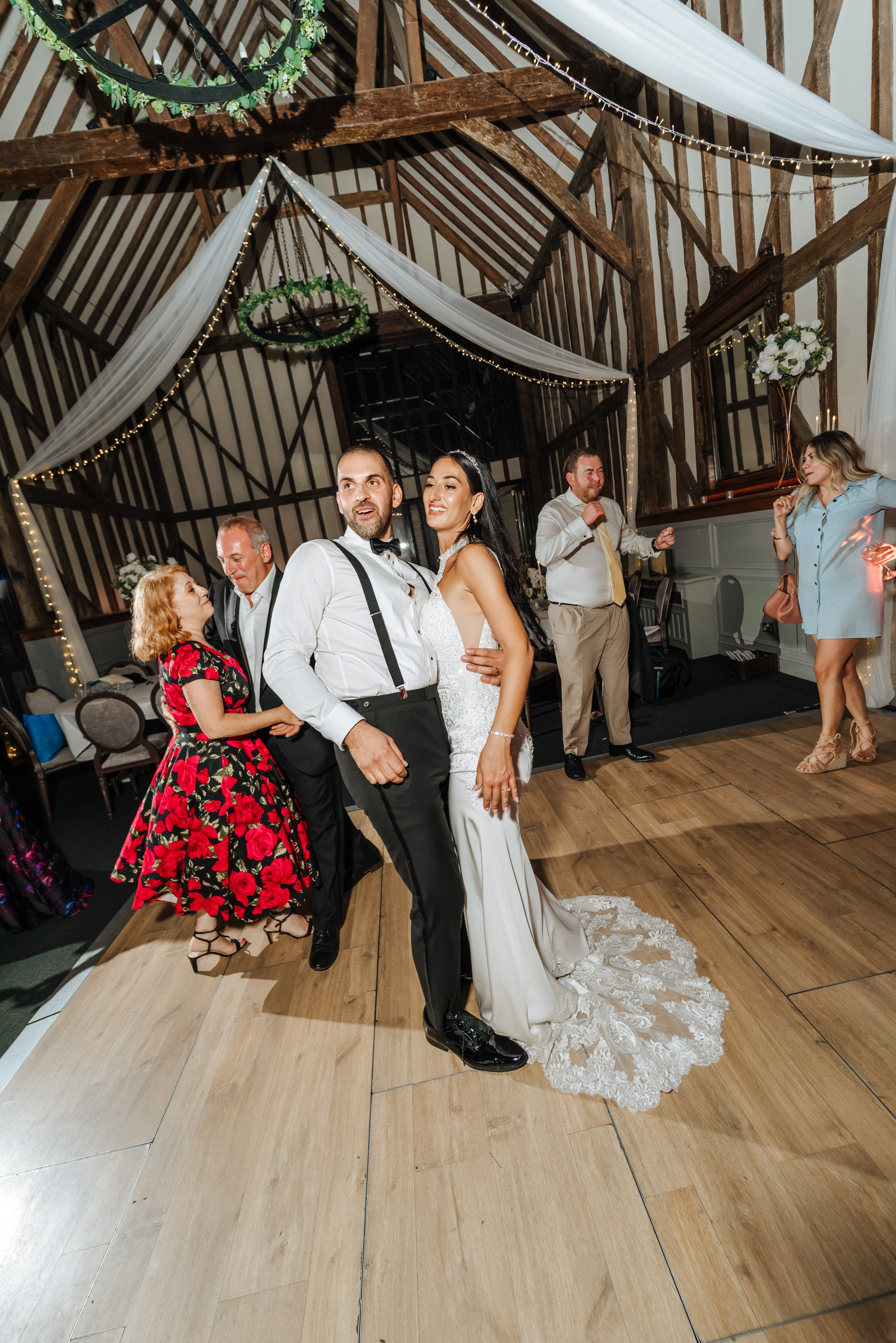Wedding couple celebrating with guests at Essendon Country Club