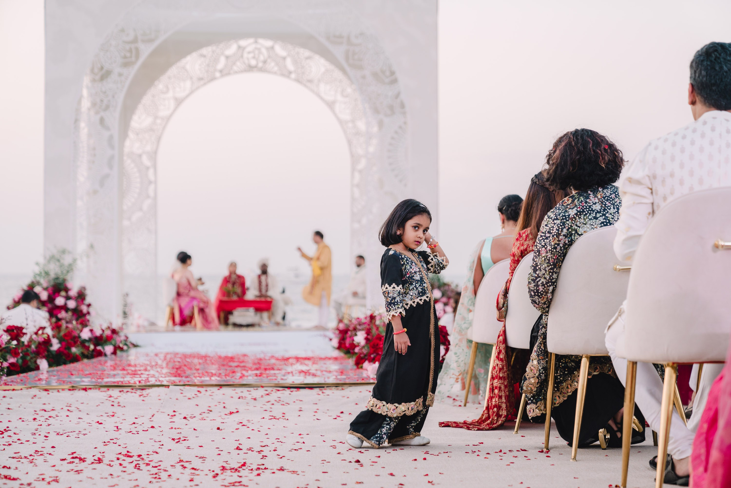 Girl enjoying herself while wedding ceremony is ongoing