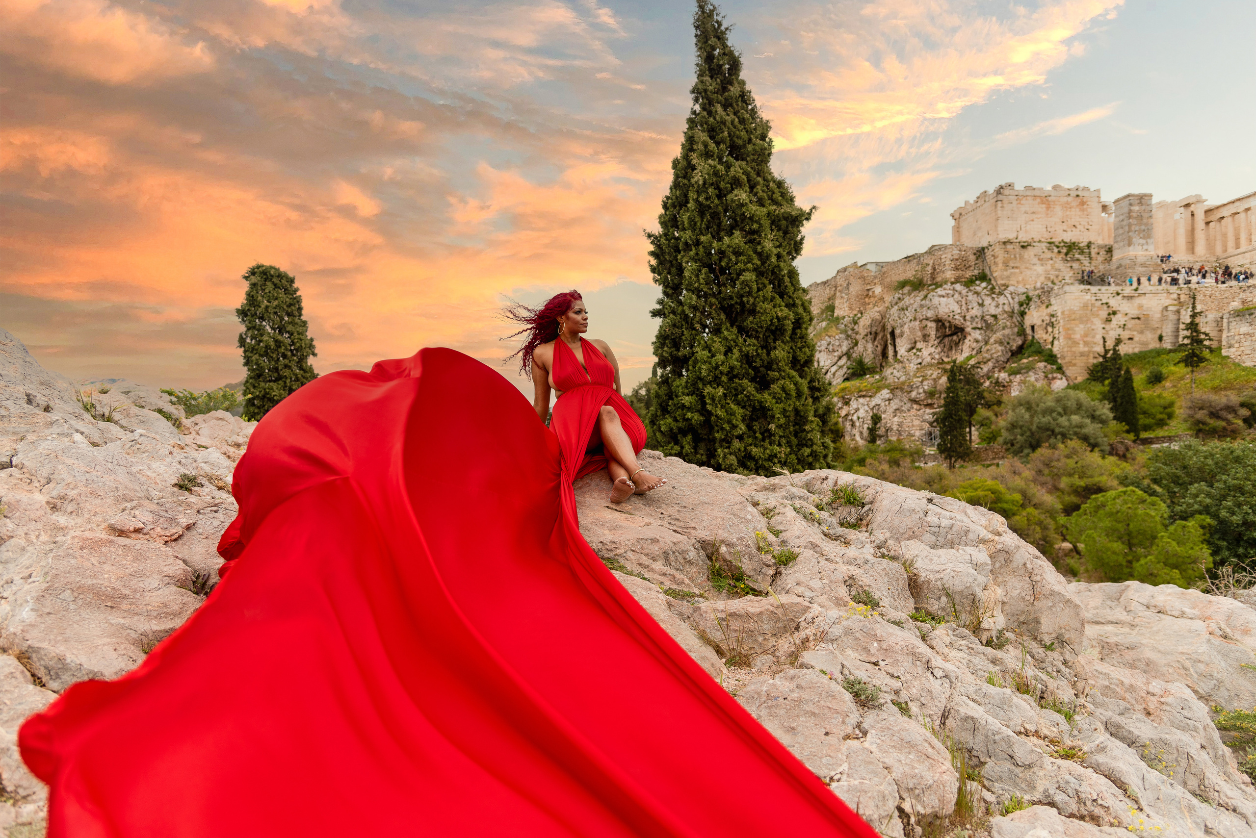 Girl in the background of the pantheon in a red flying dress
