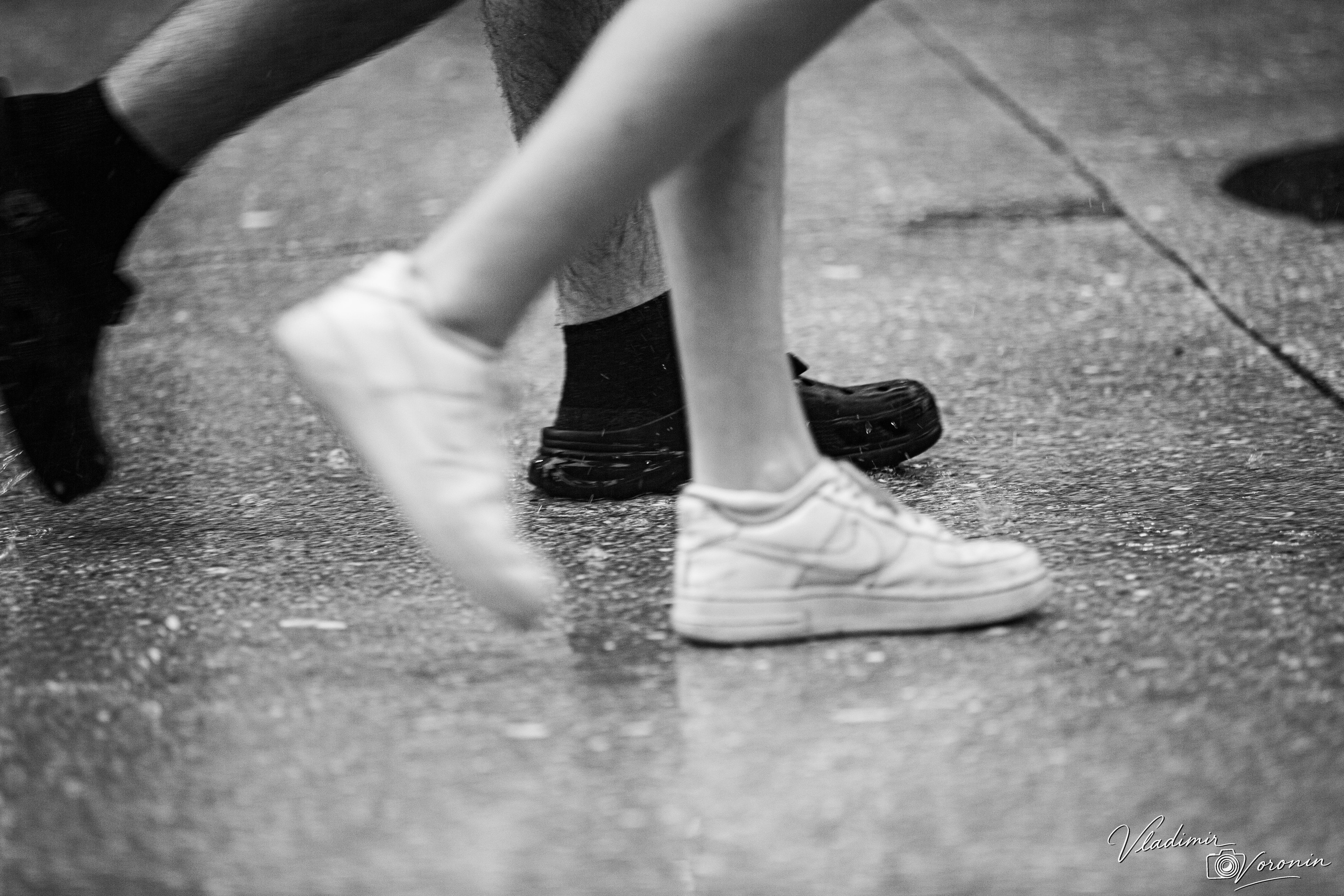 Rain in downtown. Photographer St. Augustine