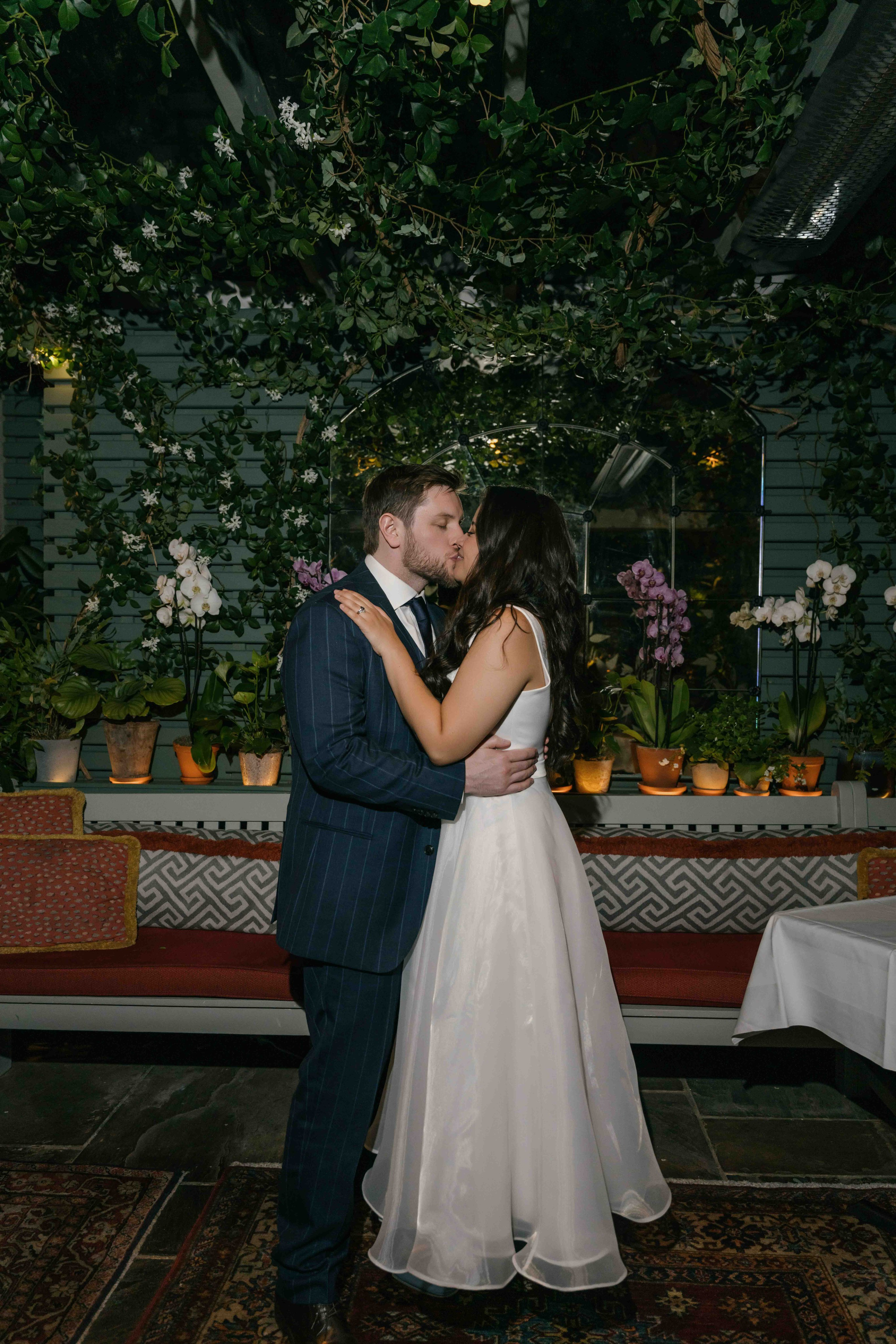 Couple during evening reception in London, cinematic light and intimate mood