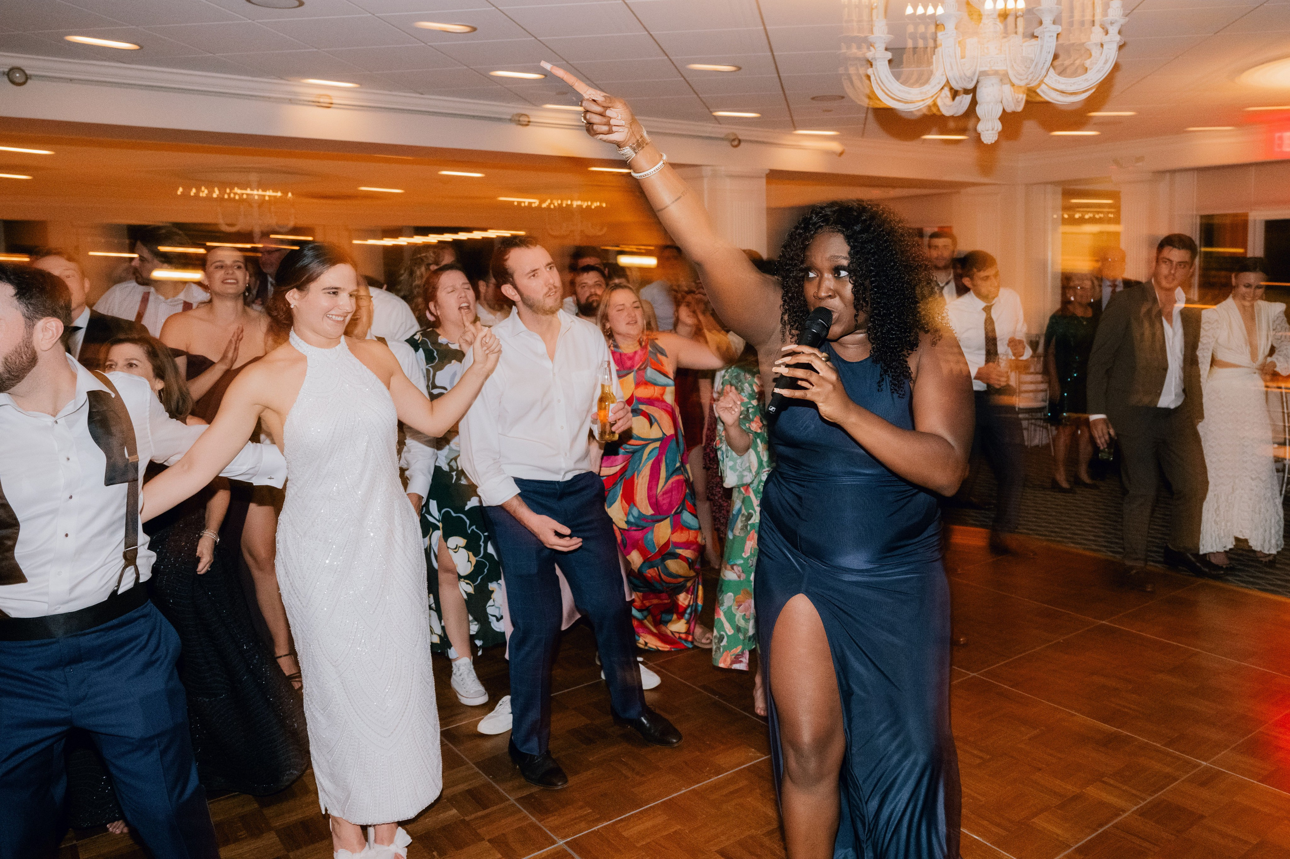 a group of people dancing in a room