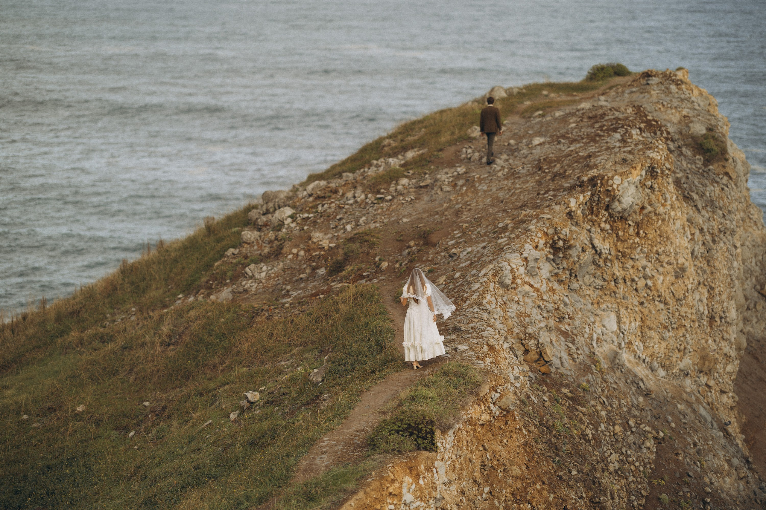 Madeira elopement photographer capturing a private wedding with cliffs and ocean backdrop.