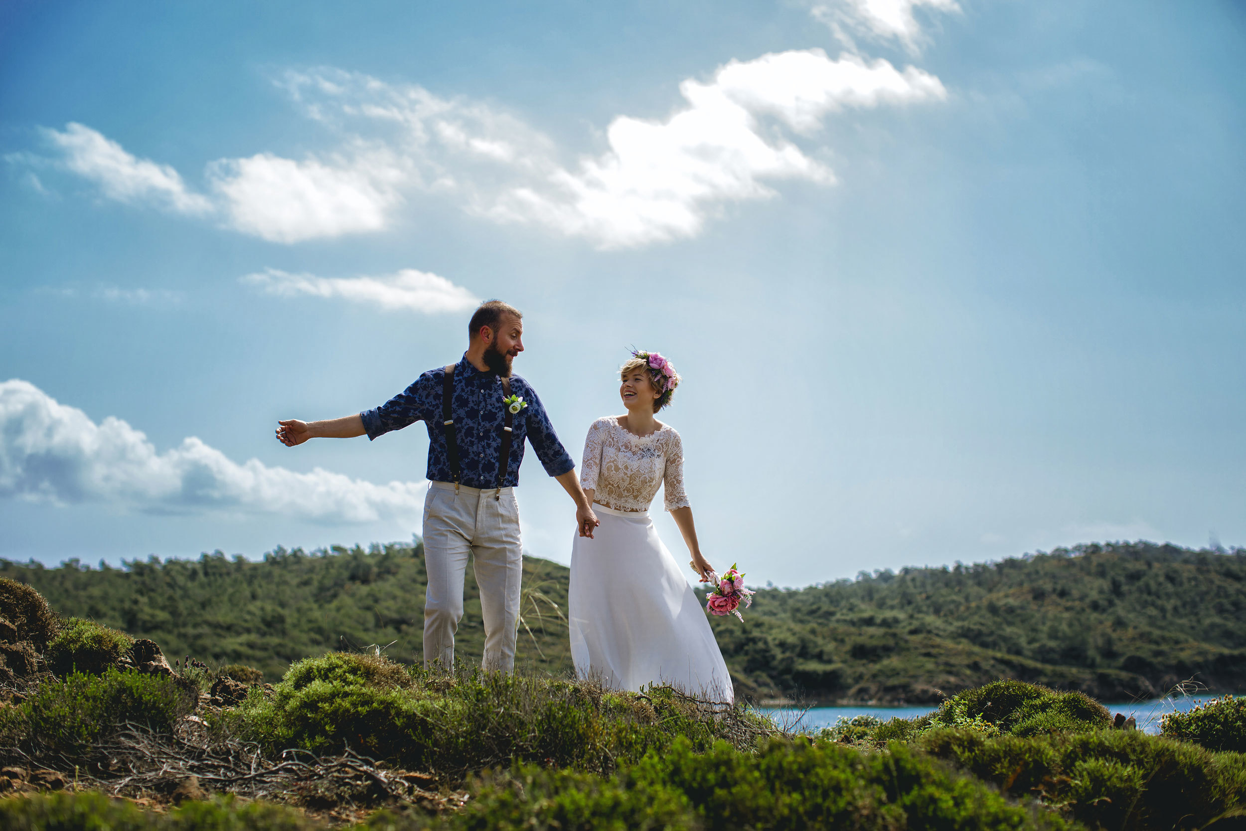 Outdoor wedding photo session on the wild rocky beaches of Amazon. Julia Ganch I Fashion Wedding Photography I Cappadocia Turkey