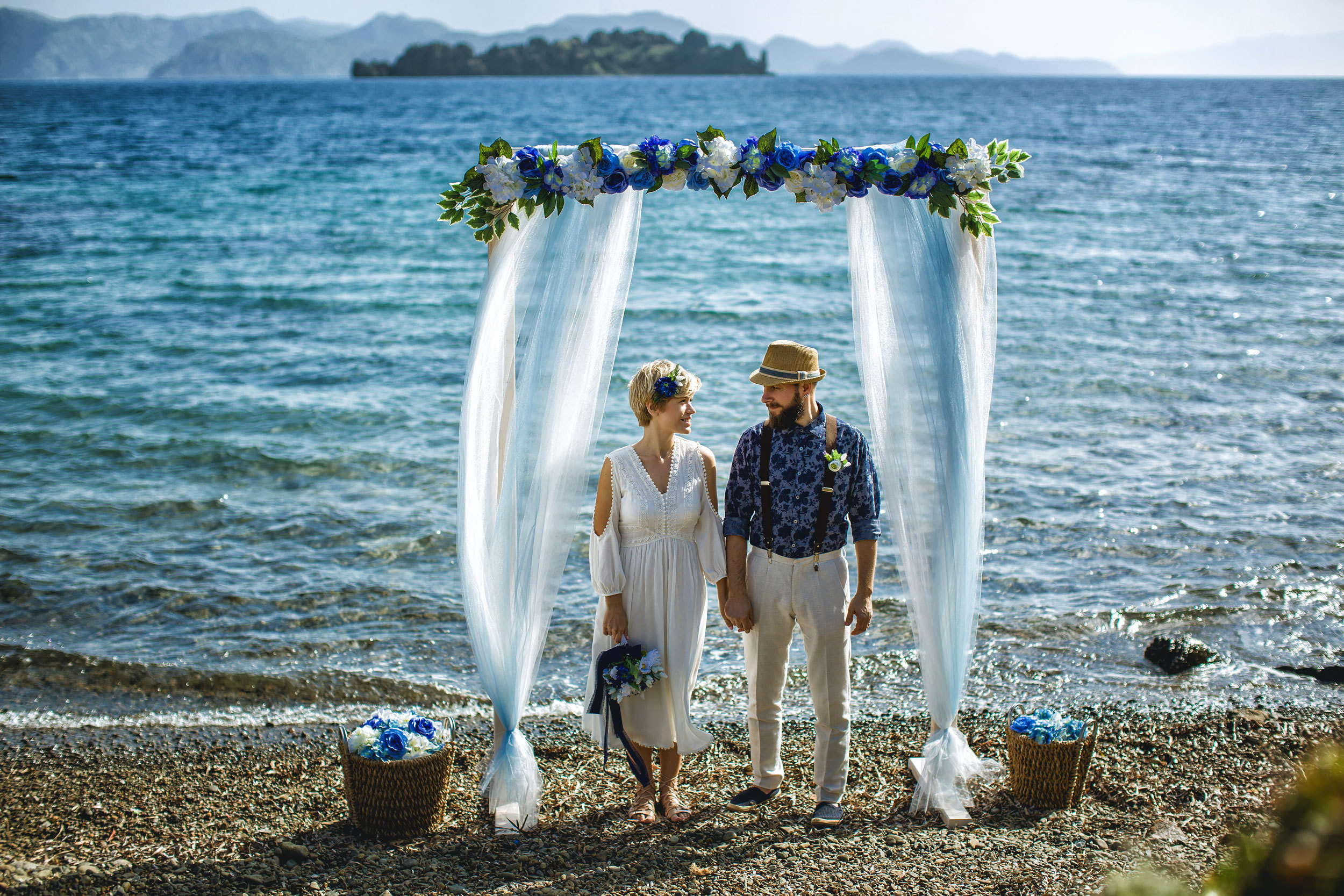 Outdoor wedding photo session on the wild rocky beaches of Amazon. Julia Ganch I Fashion Wedding Photography I Cappadocia Turkey
