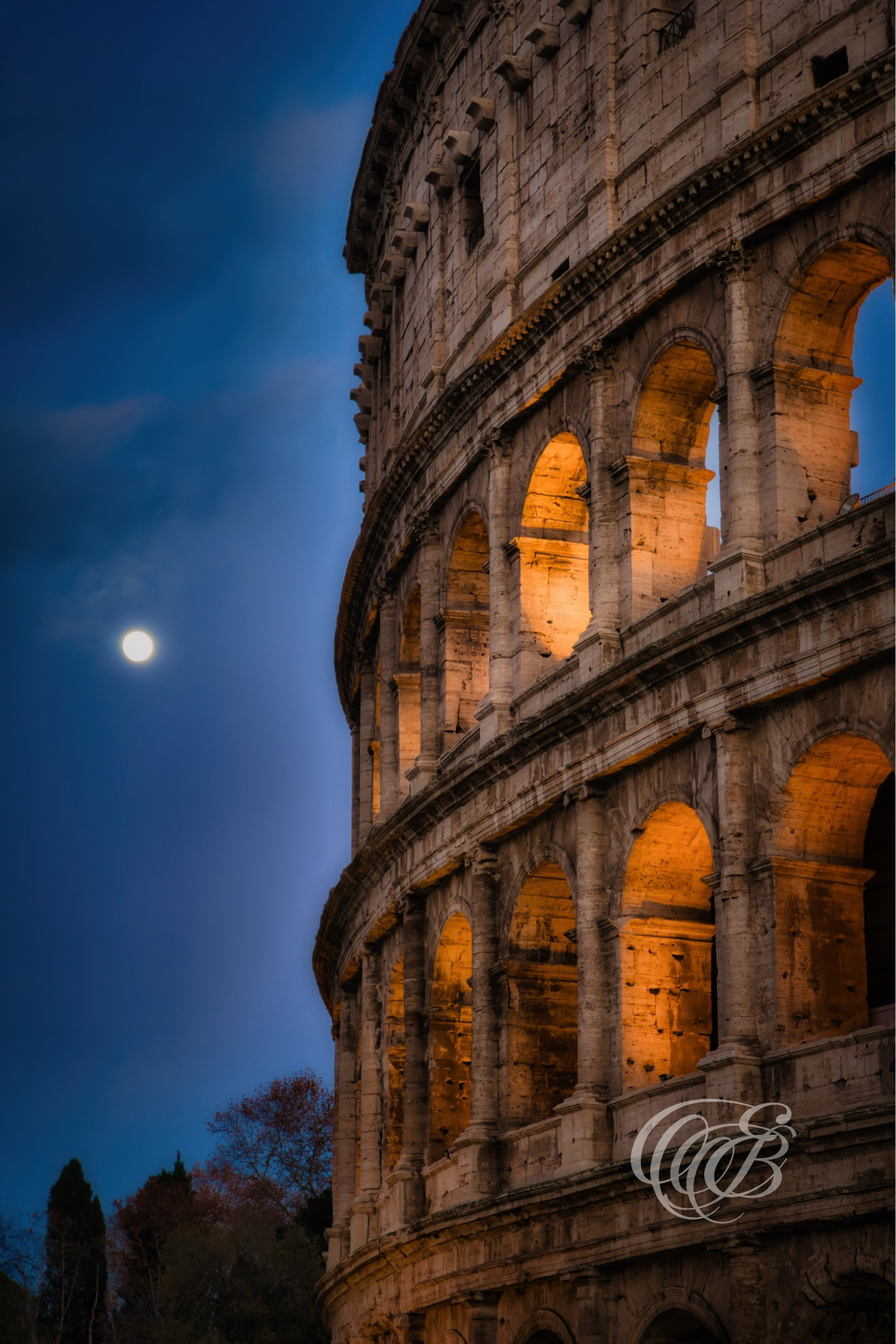 Rome Italy - The Colosseum at dusk in Full Moon - Eduardo Bartoli Fine Art Photography - Fine art photograph of the Colosseum at dusk in Rome, Italy – photography by Eduardo Bartoli.