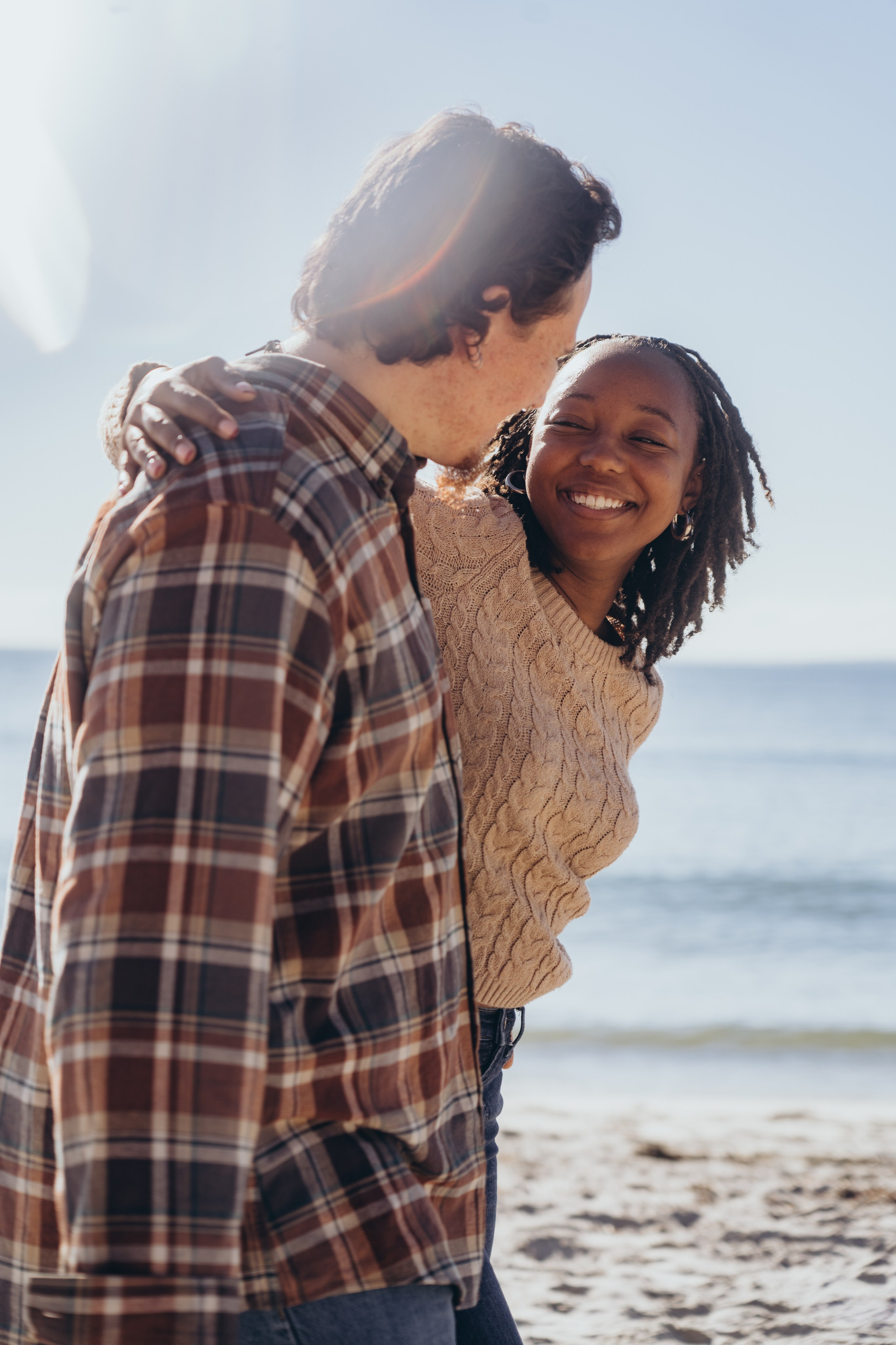 Romantic beach couple photoshoot in Connecticut. Daria Deschain Cinematic Photography in Connecticut