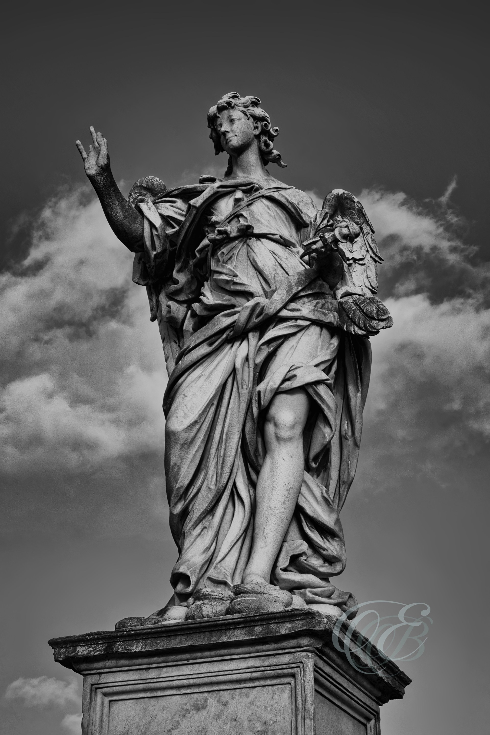 Rome Italy – Angel with the Nails dramatic – B&W – Eduardo Bartoli Fine Art Photography – Dramatic black-and-white photo of the Angel with the Nails in Rome, Italy, by Eduardo Bartoli.