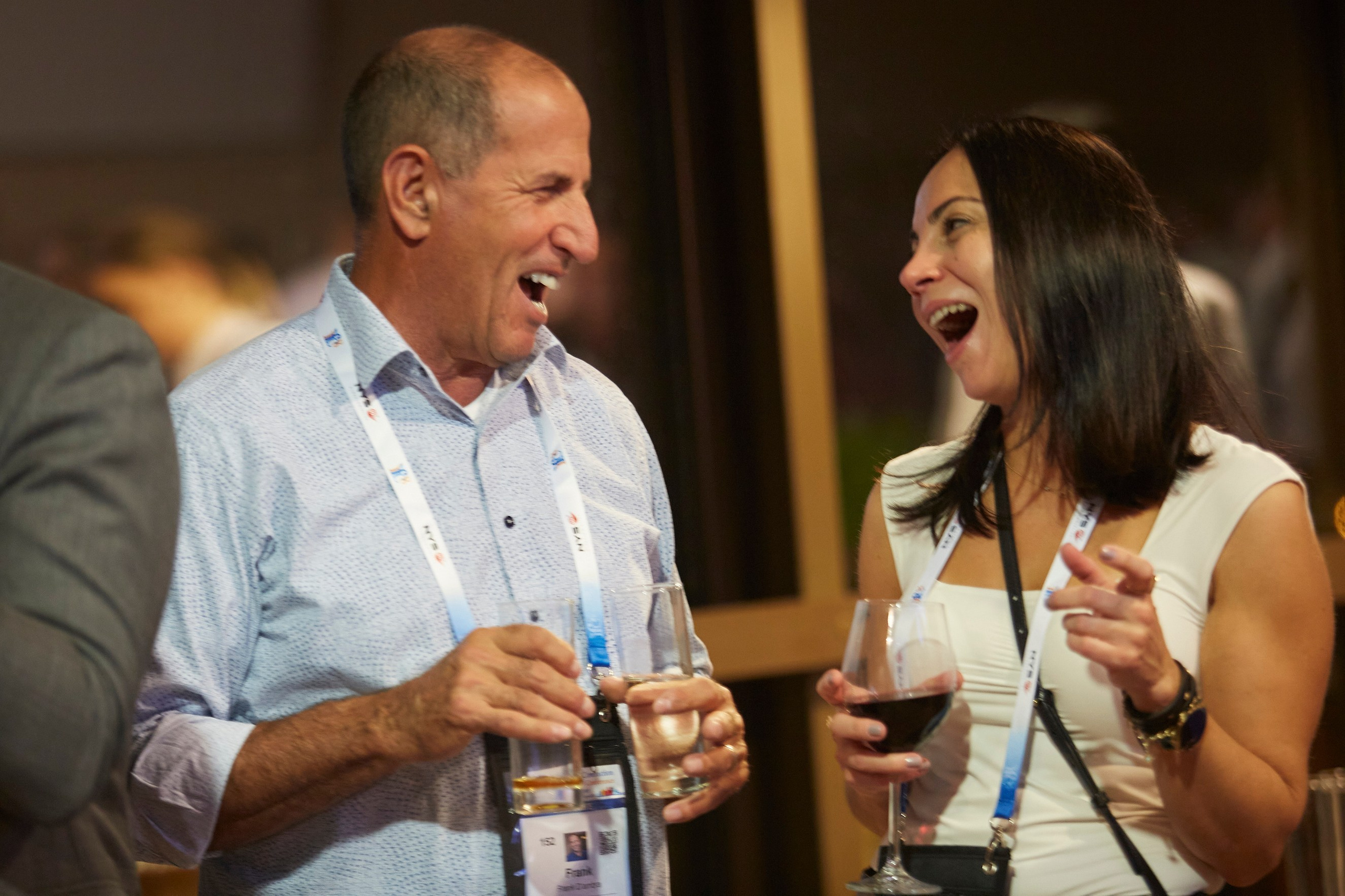 Employees celebrate with their drinks after a team building event in Prague.