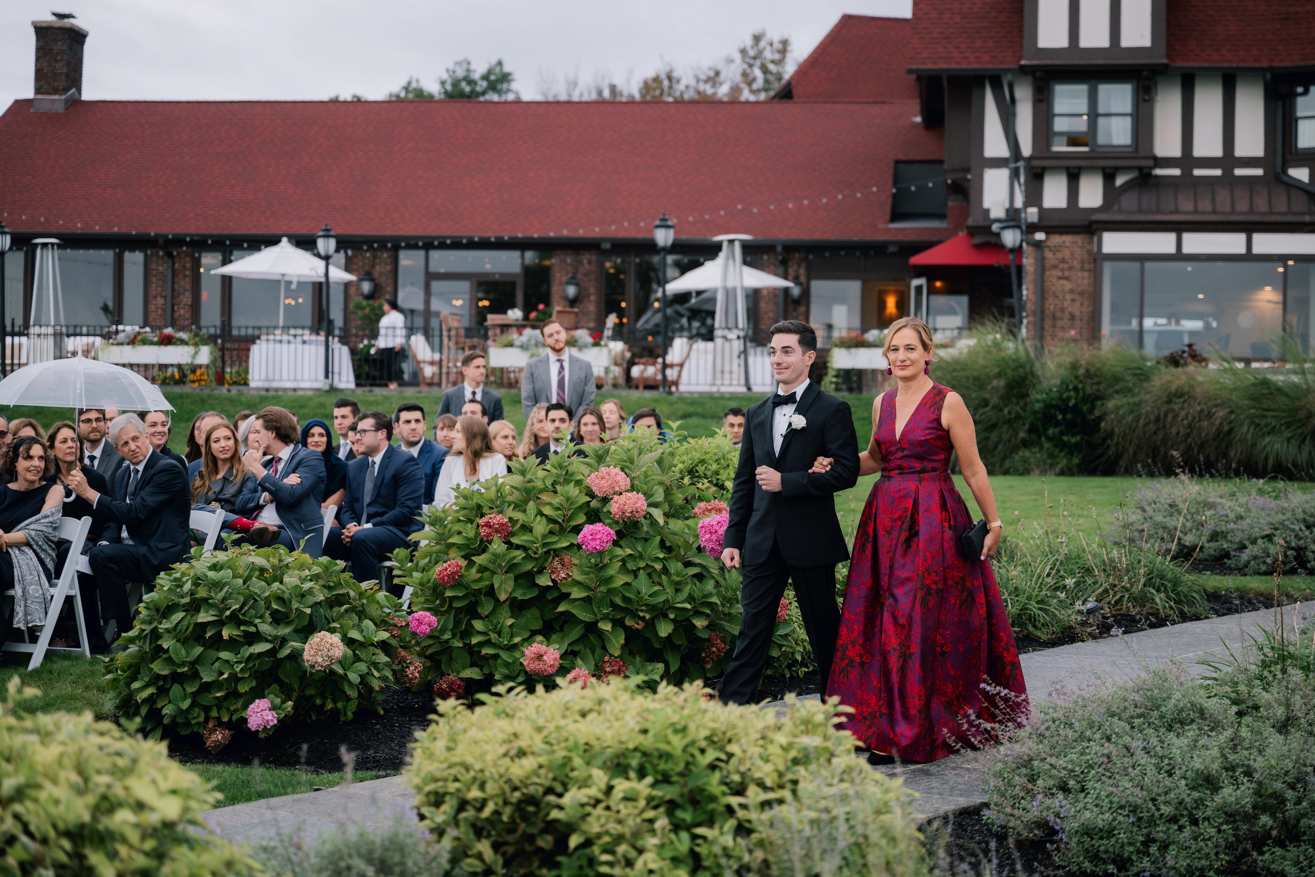 a couple walking down the aisle at a wedding