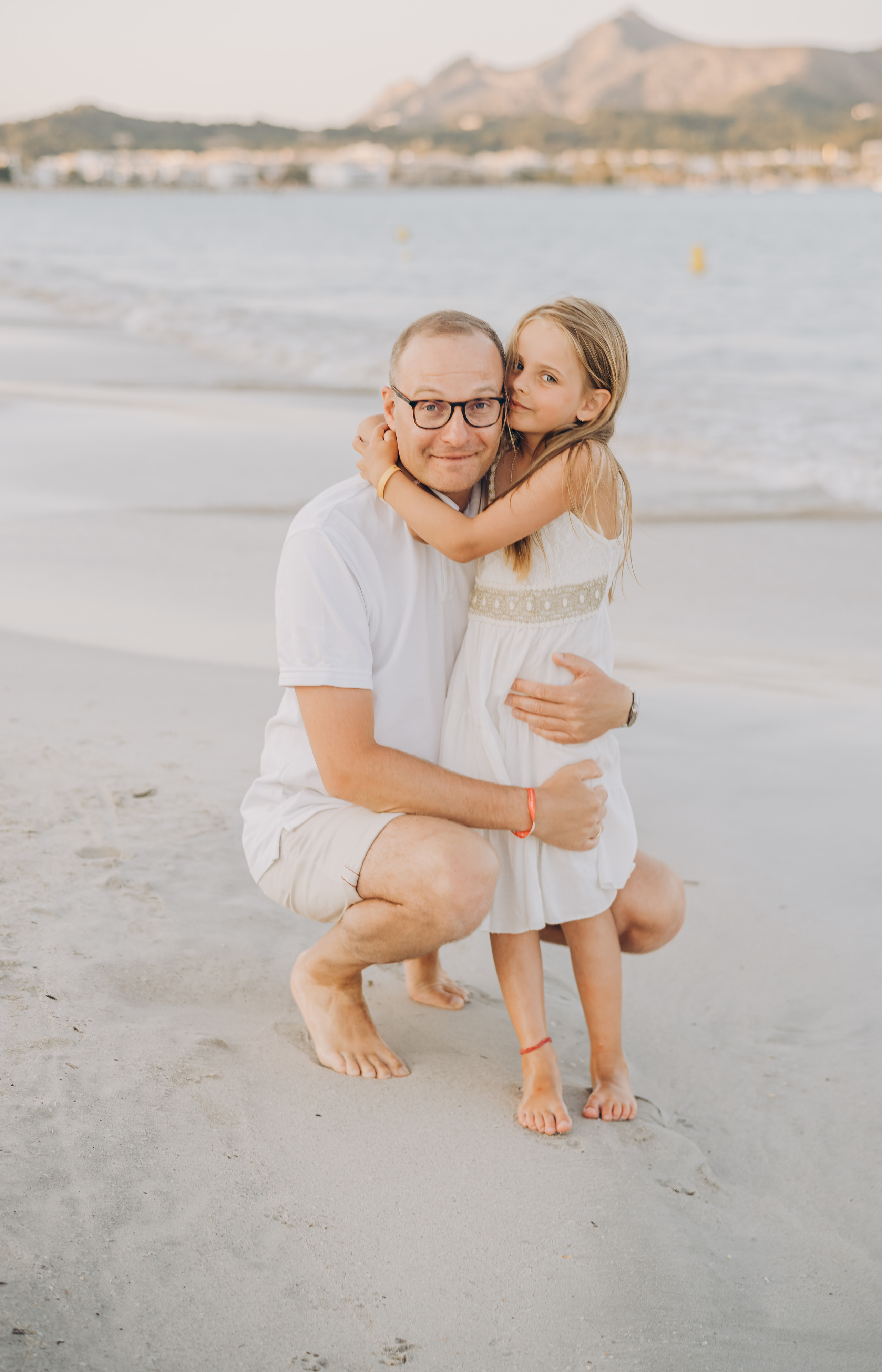 Embrace the beauty of Mallorca's beaches with a captivating family photo session