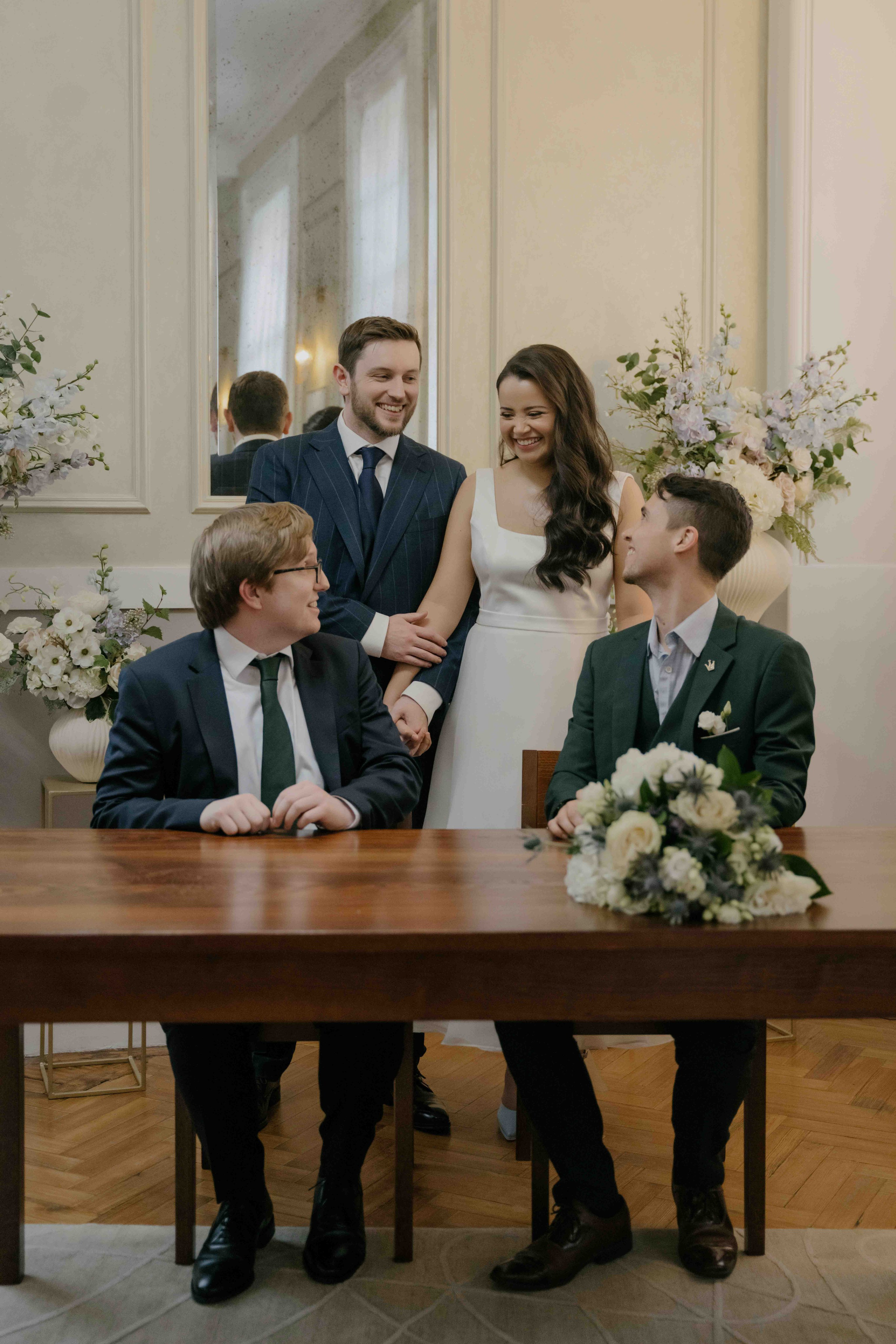 Wedding ceremony at Chelsea Town Hall London with guests, intimate and stylish city wedding