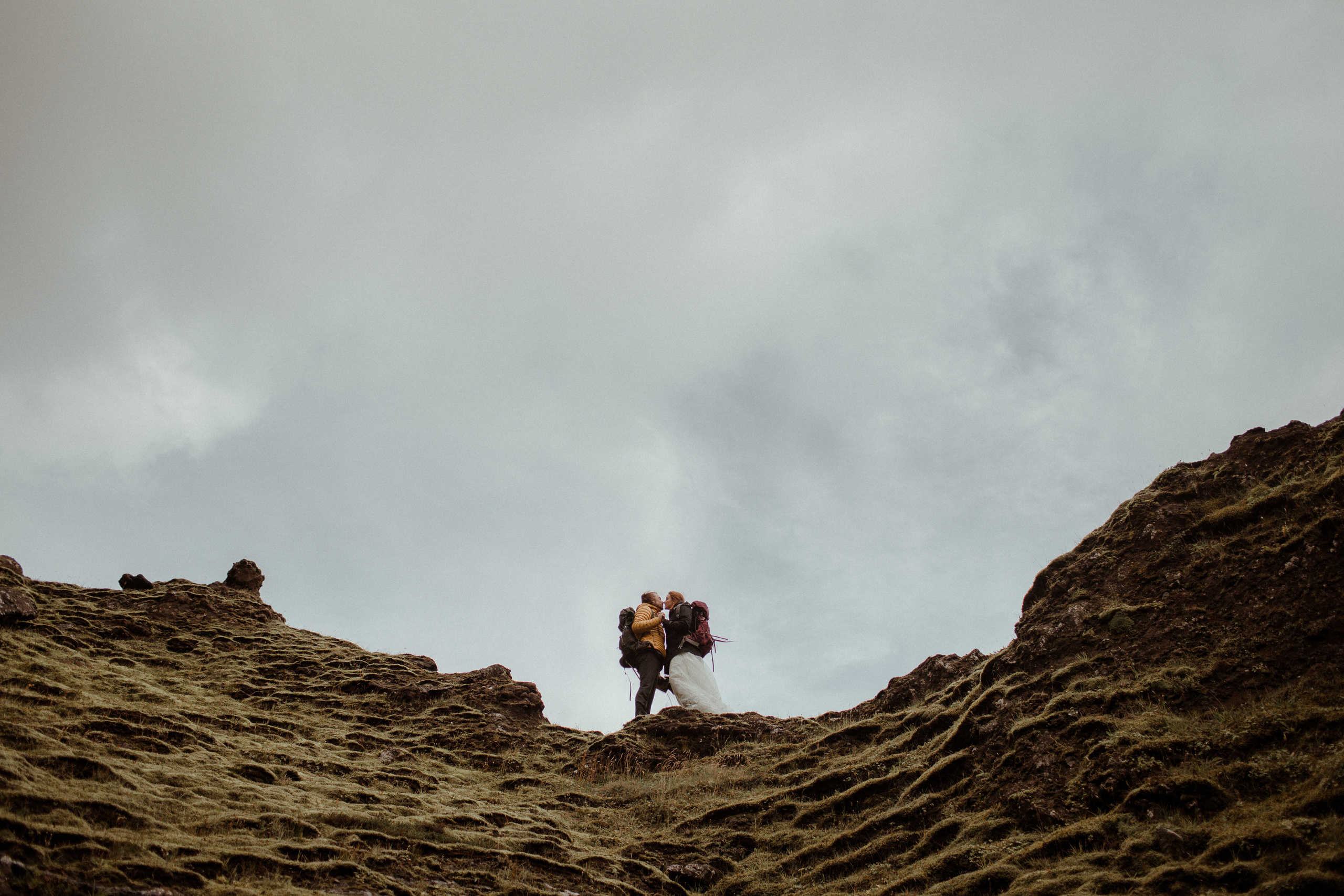 Ceremony at secret waterfall Iceland. Iceland elopement photographer & videographer