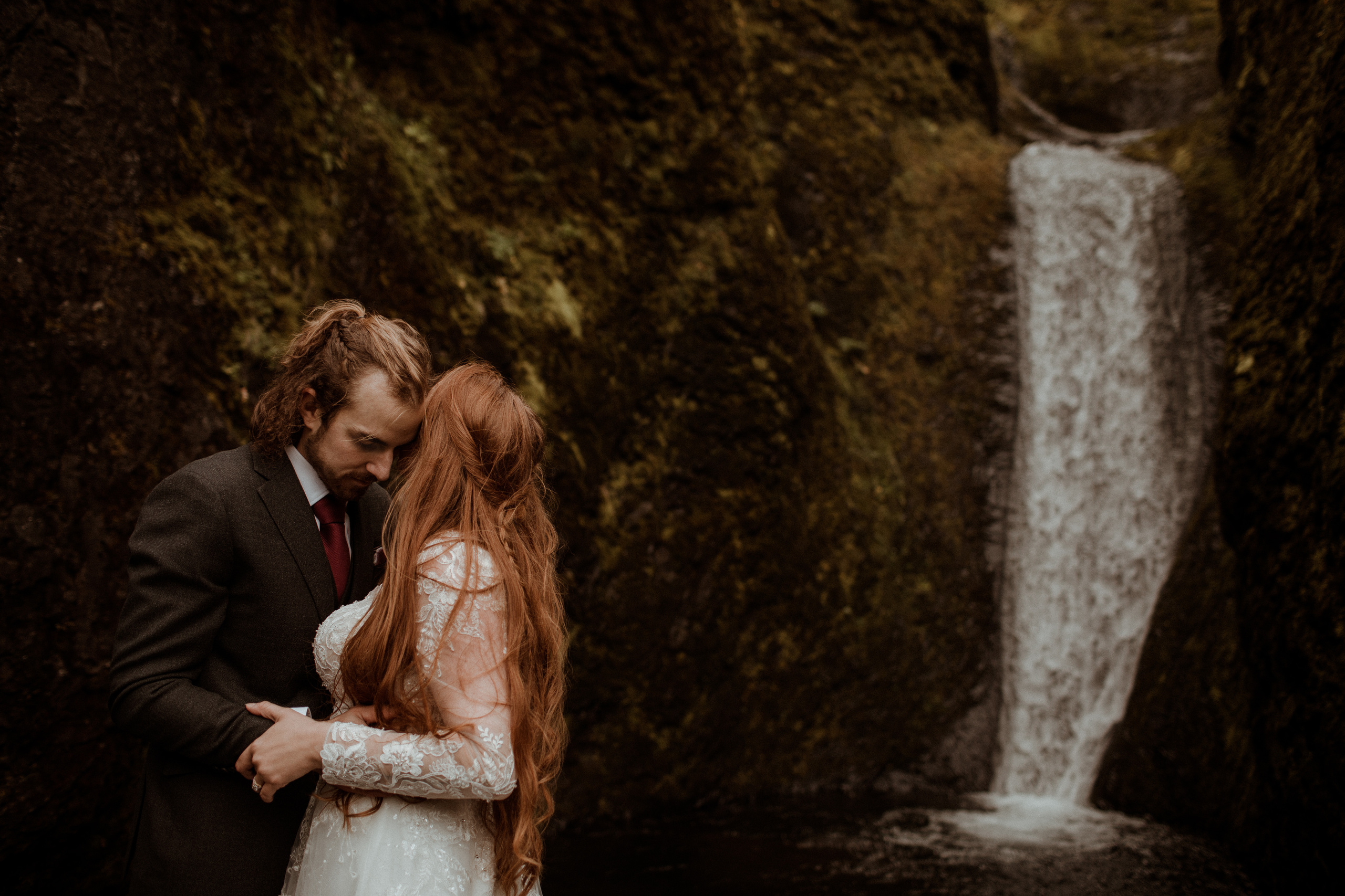 Ceremony at secret waterfall Iceland. Iceland elopement photographer & videographer