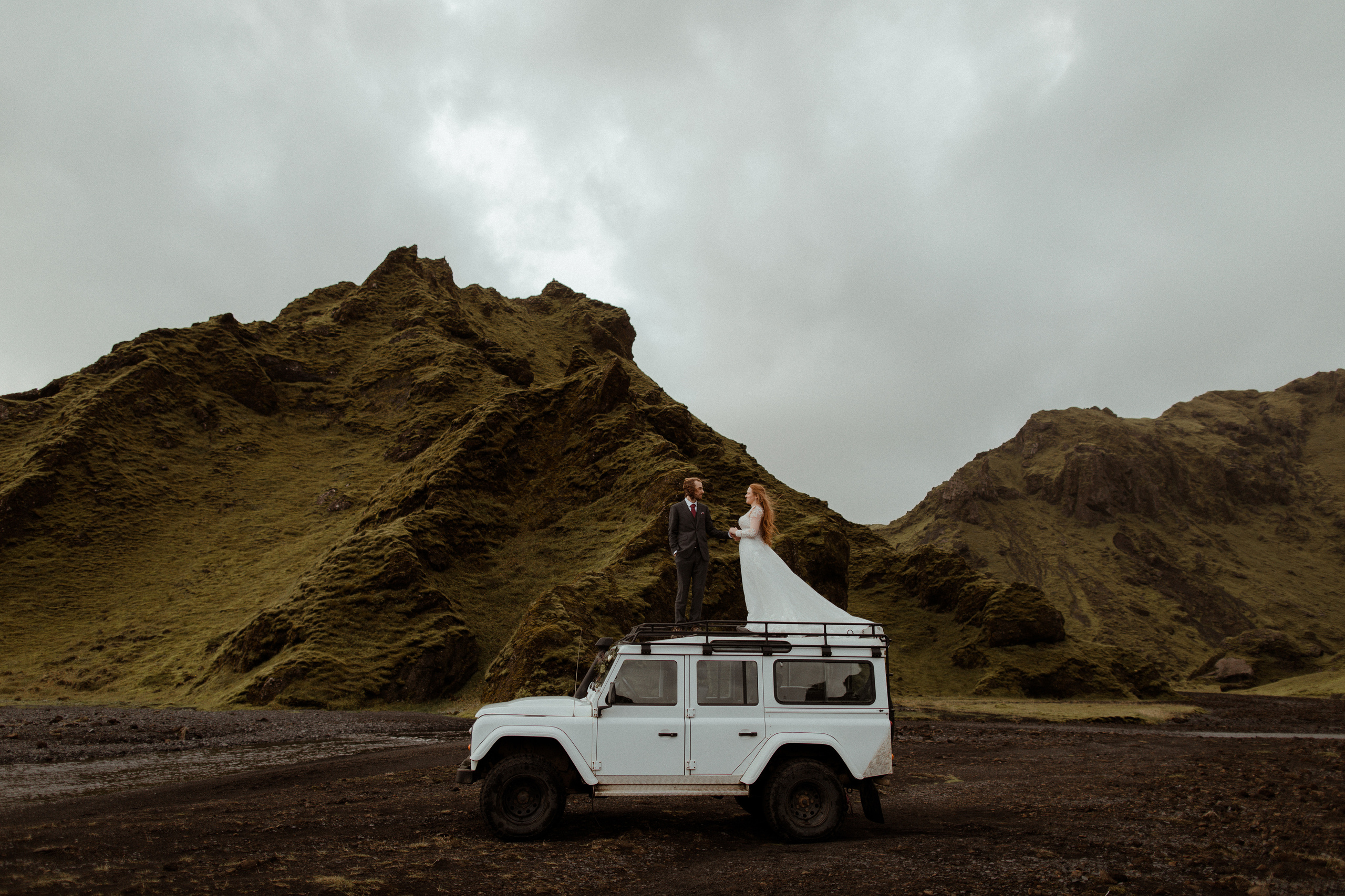 Ceremony at secret waterfall Iceland. Iceland elopement photographer & videographer