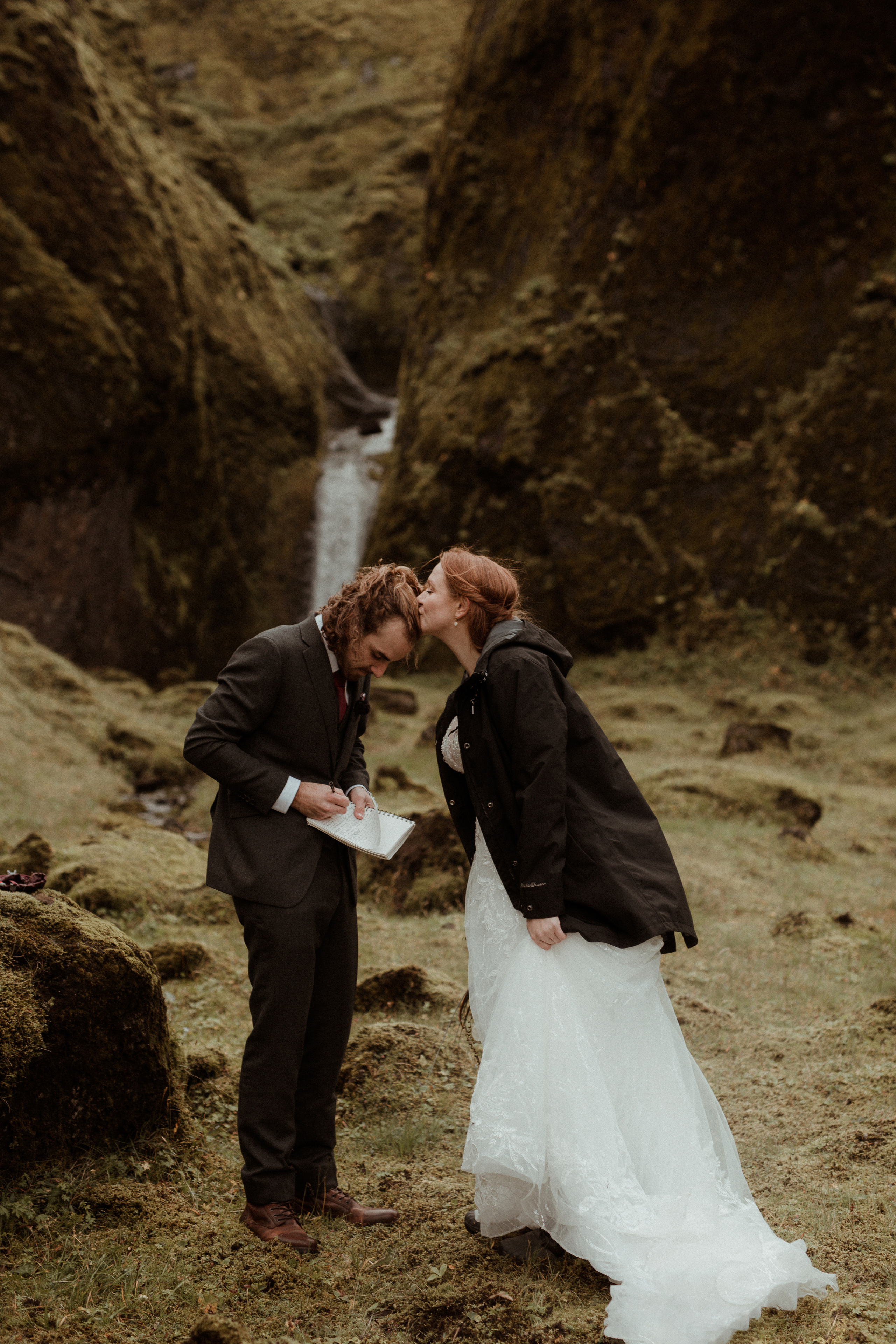 Ceremony at secret waterfall Iceland. Iceland elopement photographer & videographer