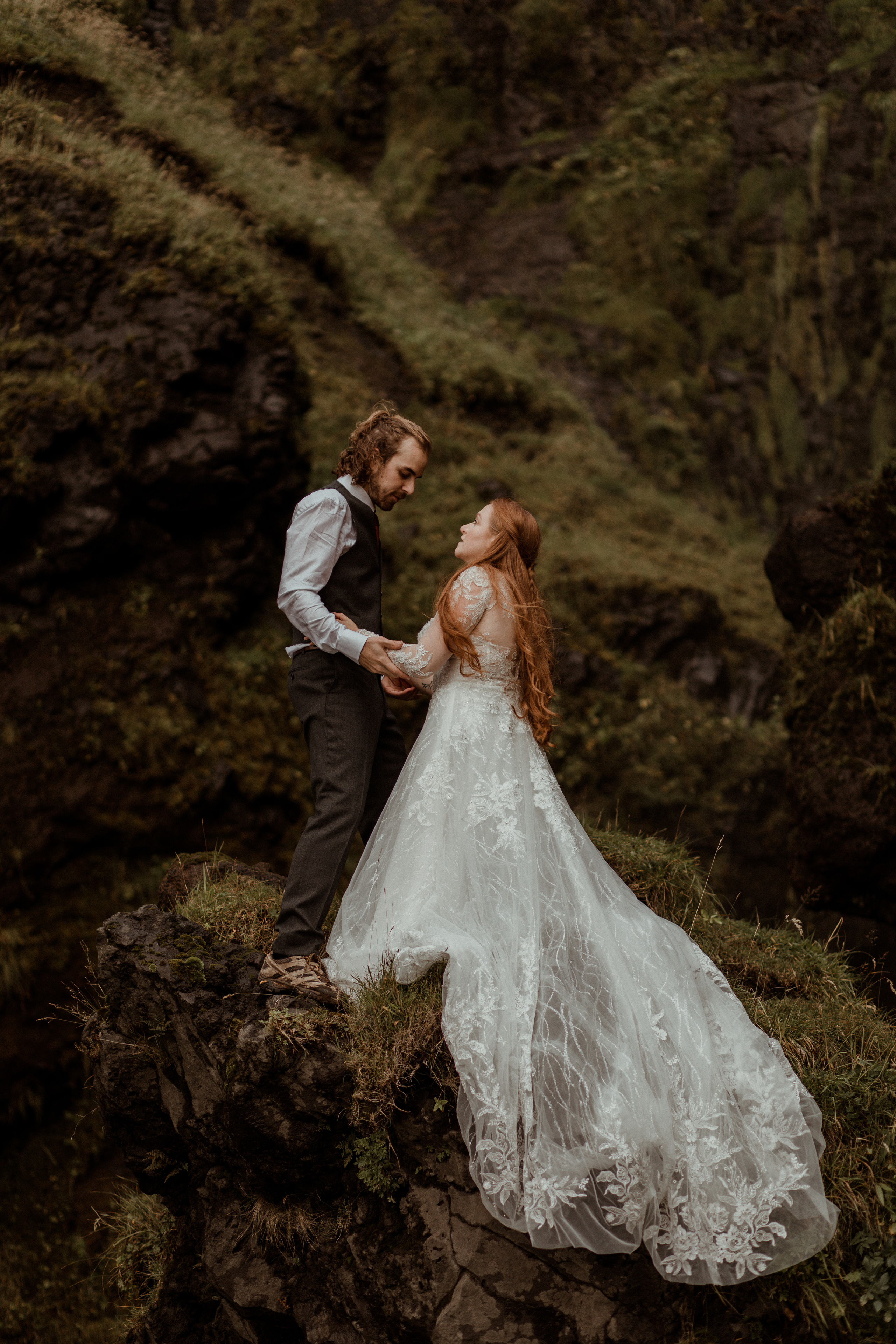 Ceremony at secret waterfall Iceland. Iceland elopement photographer & videographer