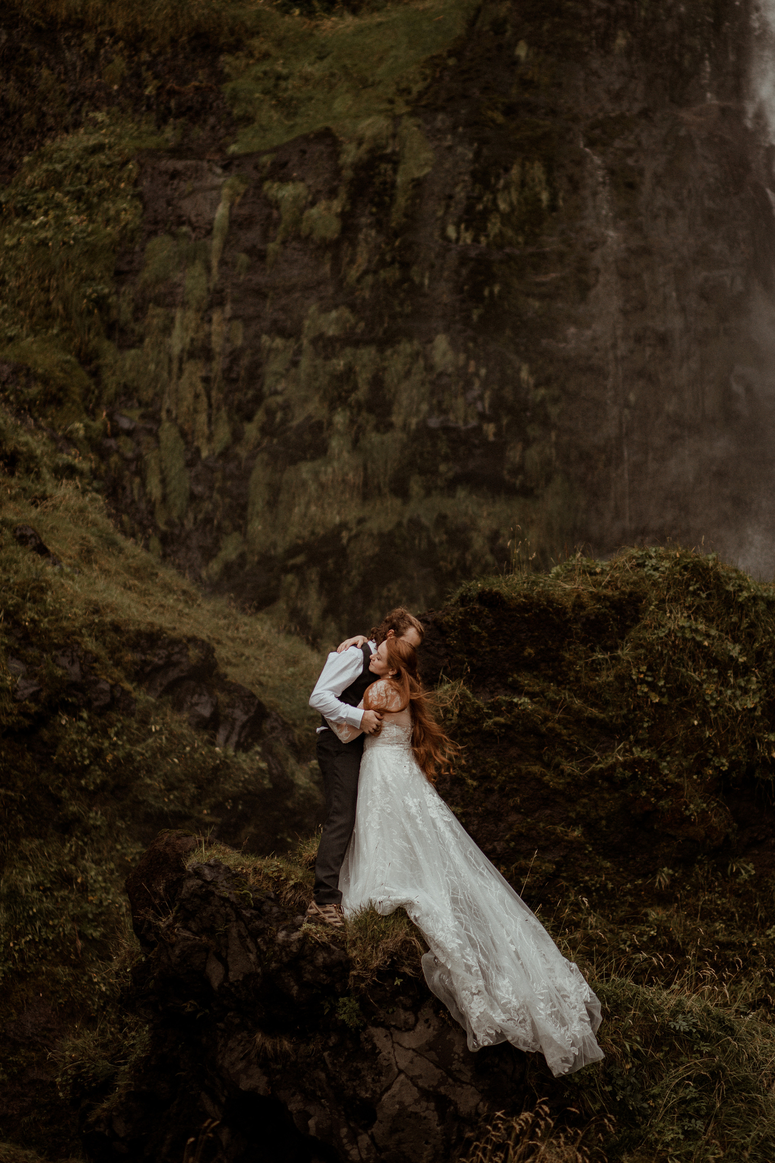 Ceremony at secret waterfall Iceland. Iceland elopement photographer & videographer