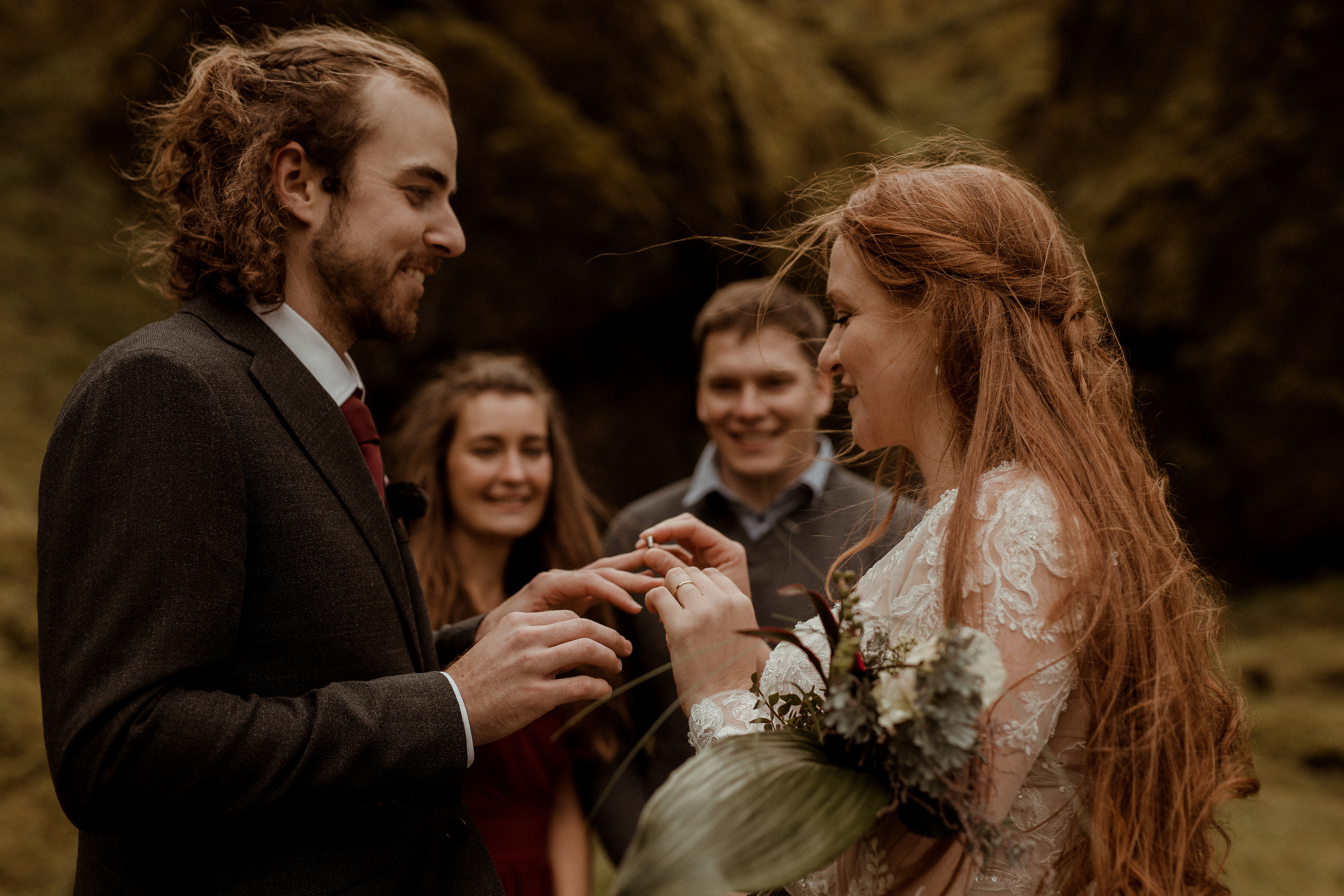 Ceremony at secret waterfall Iceland. Iceland elopement photographer & videographer