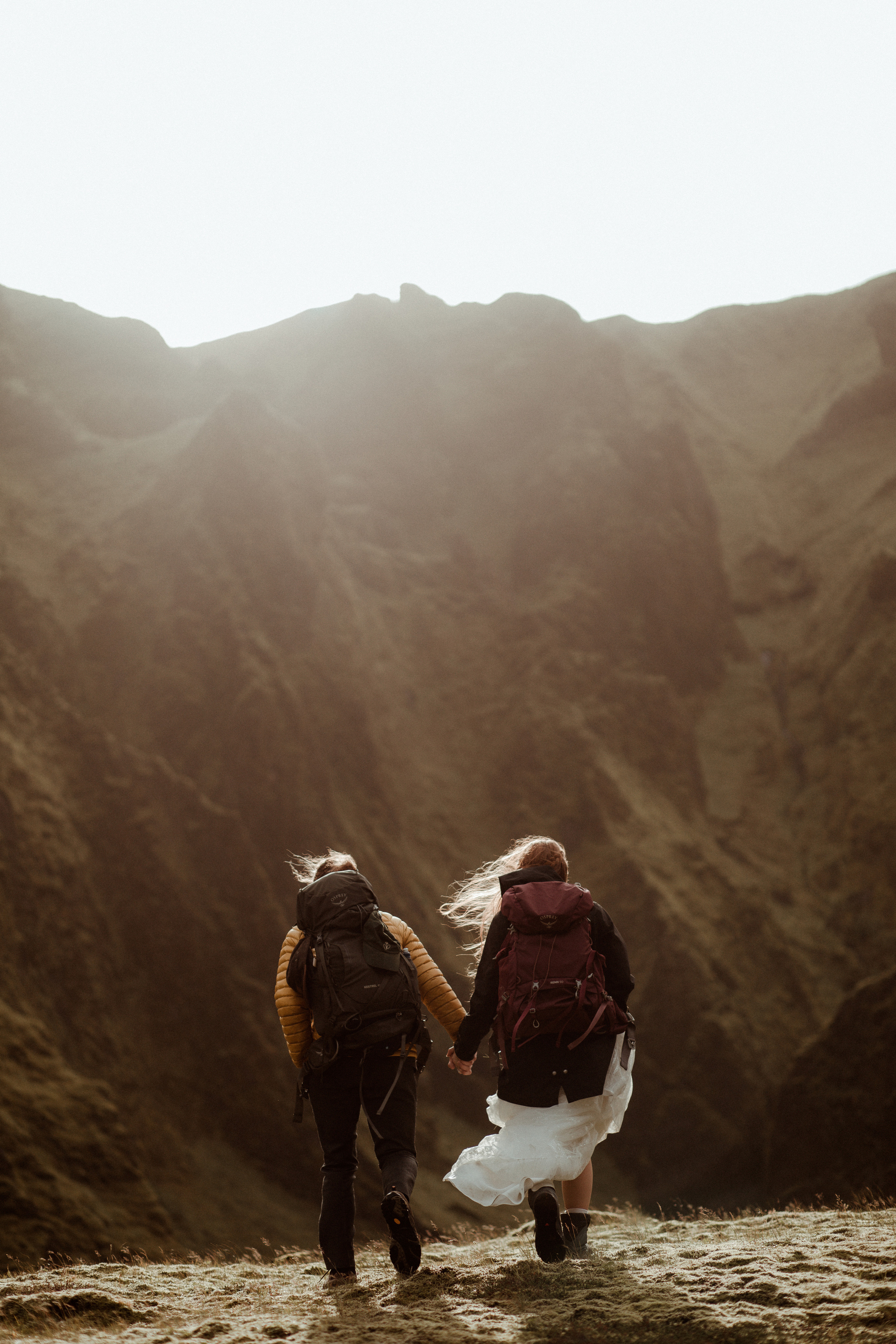 Ceremony at secret waterfall Iceland. Iceland elopement photographer & videographer