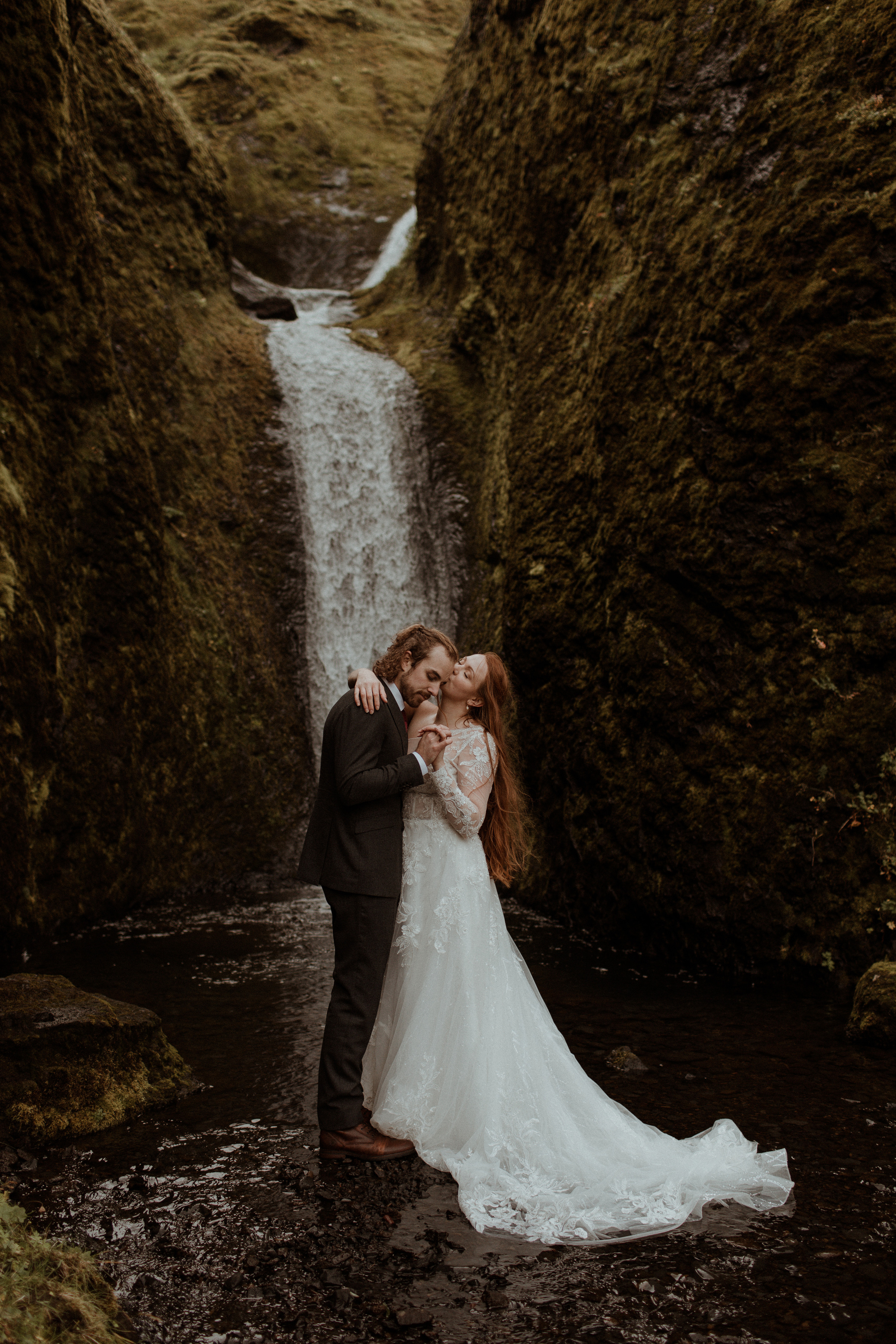Ceremony at secret waterfall Iceland. Iceland elopement photographer & videographer
