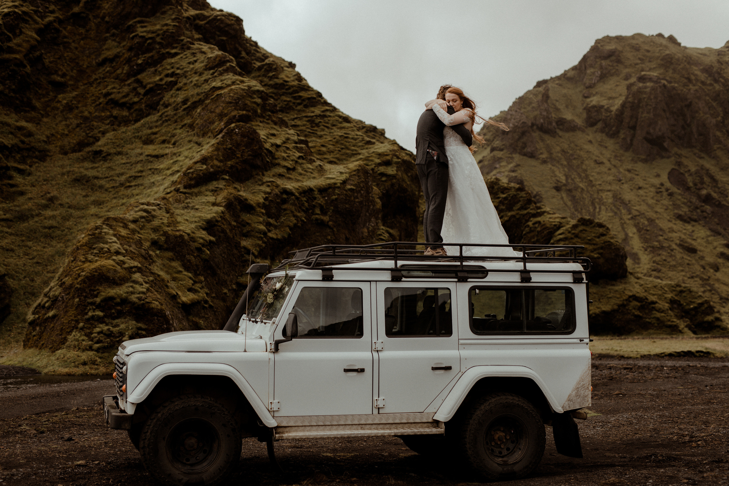 Ceremony at secret waterfall Iceland. Iceland elopement photographer & videographer