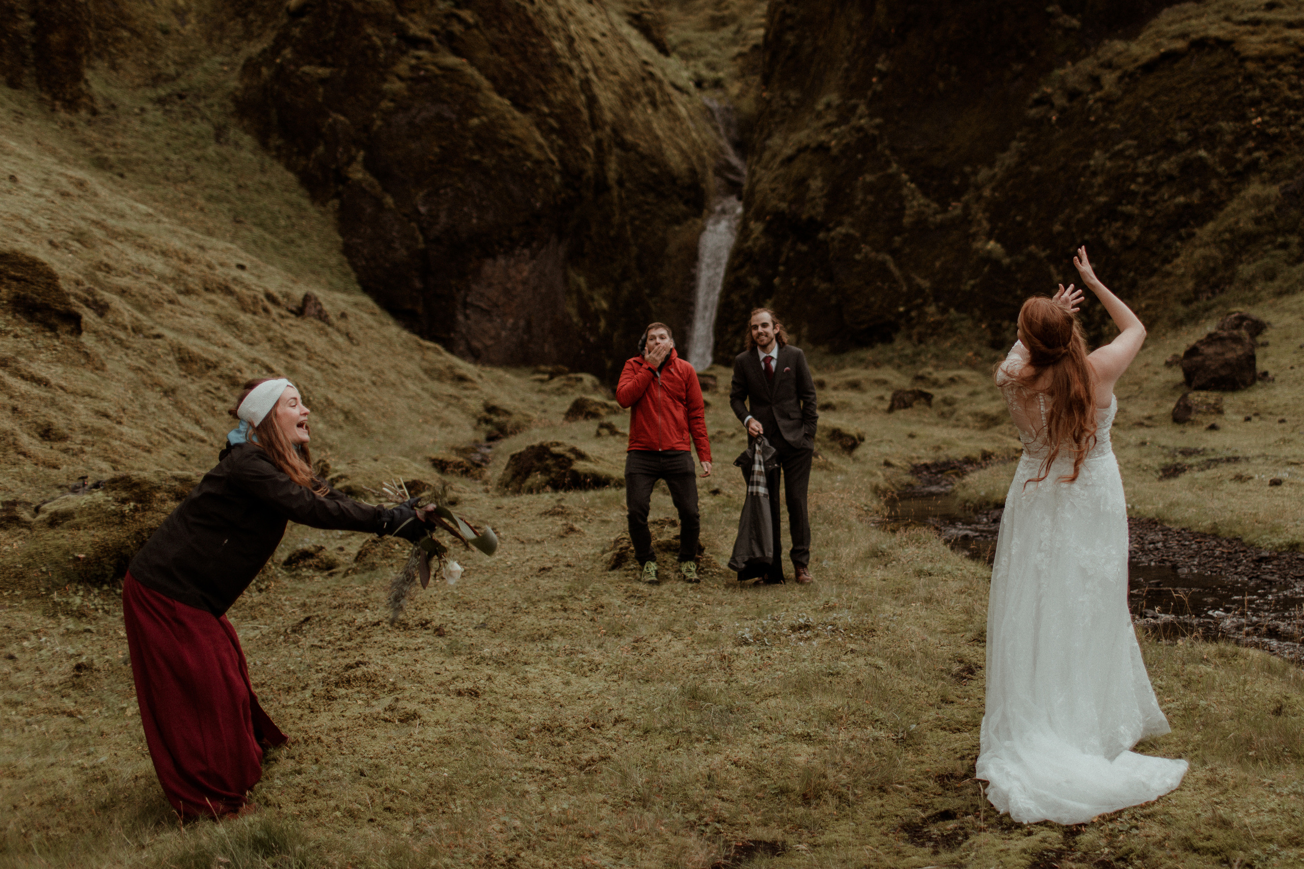 Ceremony at secret waterfall Iceland. Iceland elopement photographer & videographer