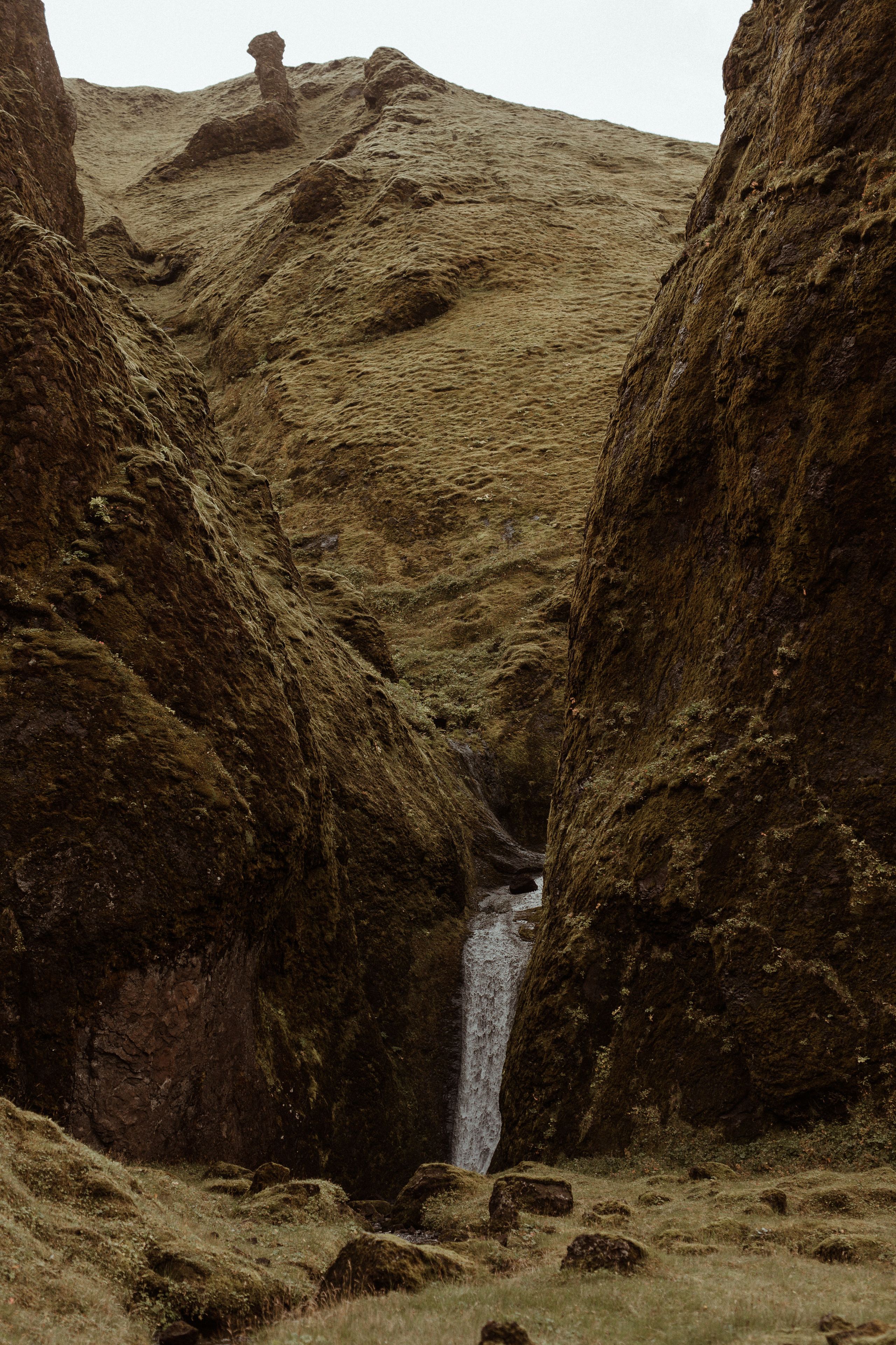 Ceremony at secret waterfall Iceland. Iceland elopement photographer & videographer
