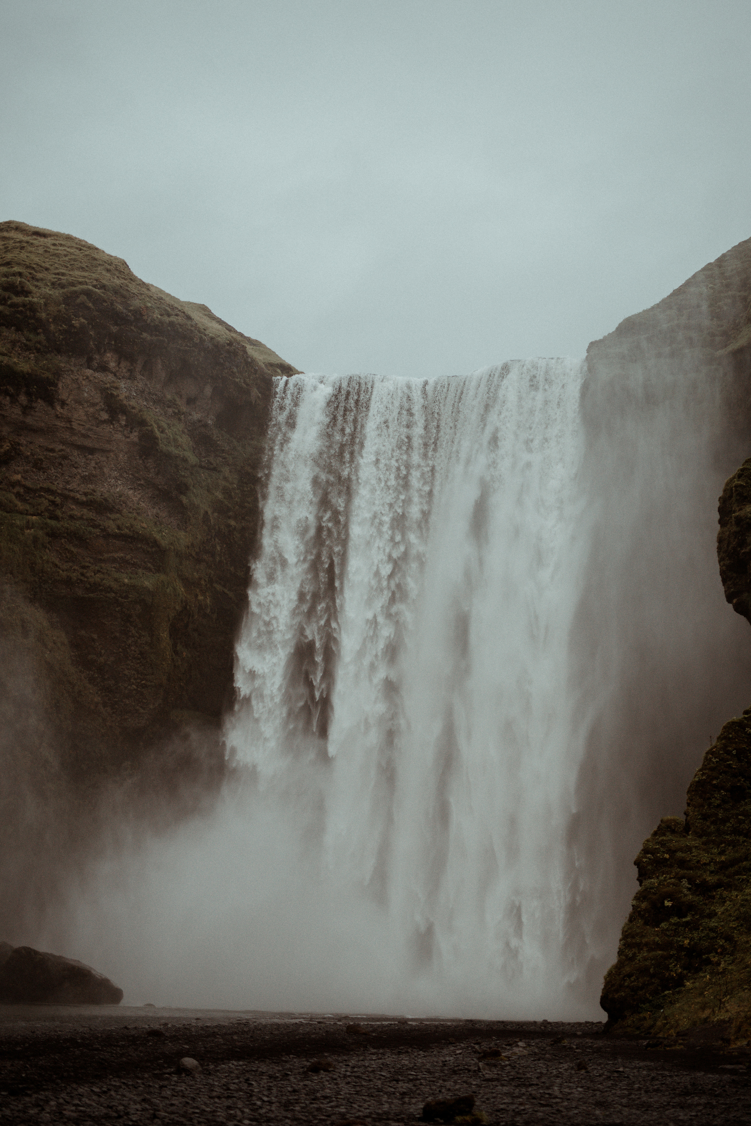 Ceremony at secret waterfall Iceland. Iceland elopement photographer & videographer