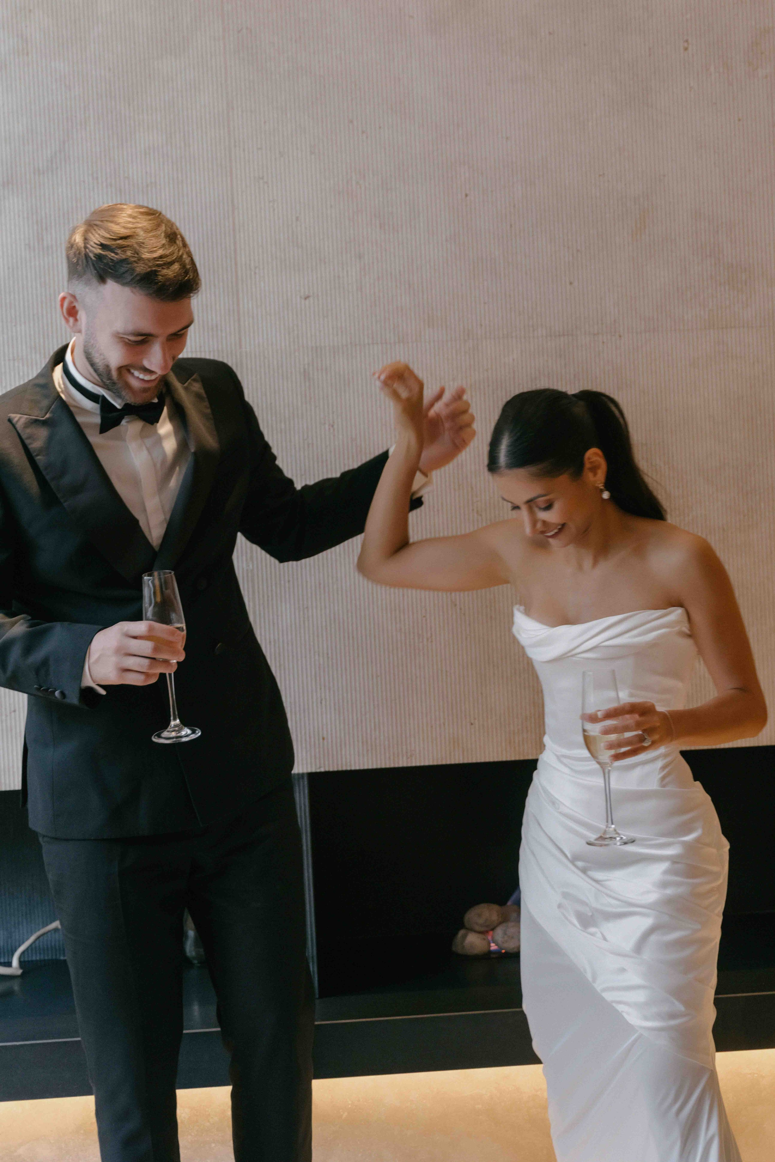 joyful wedding moment London bride and groom laughing candid intimate wedding photography UK
