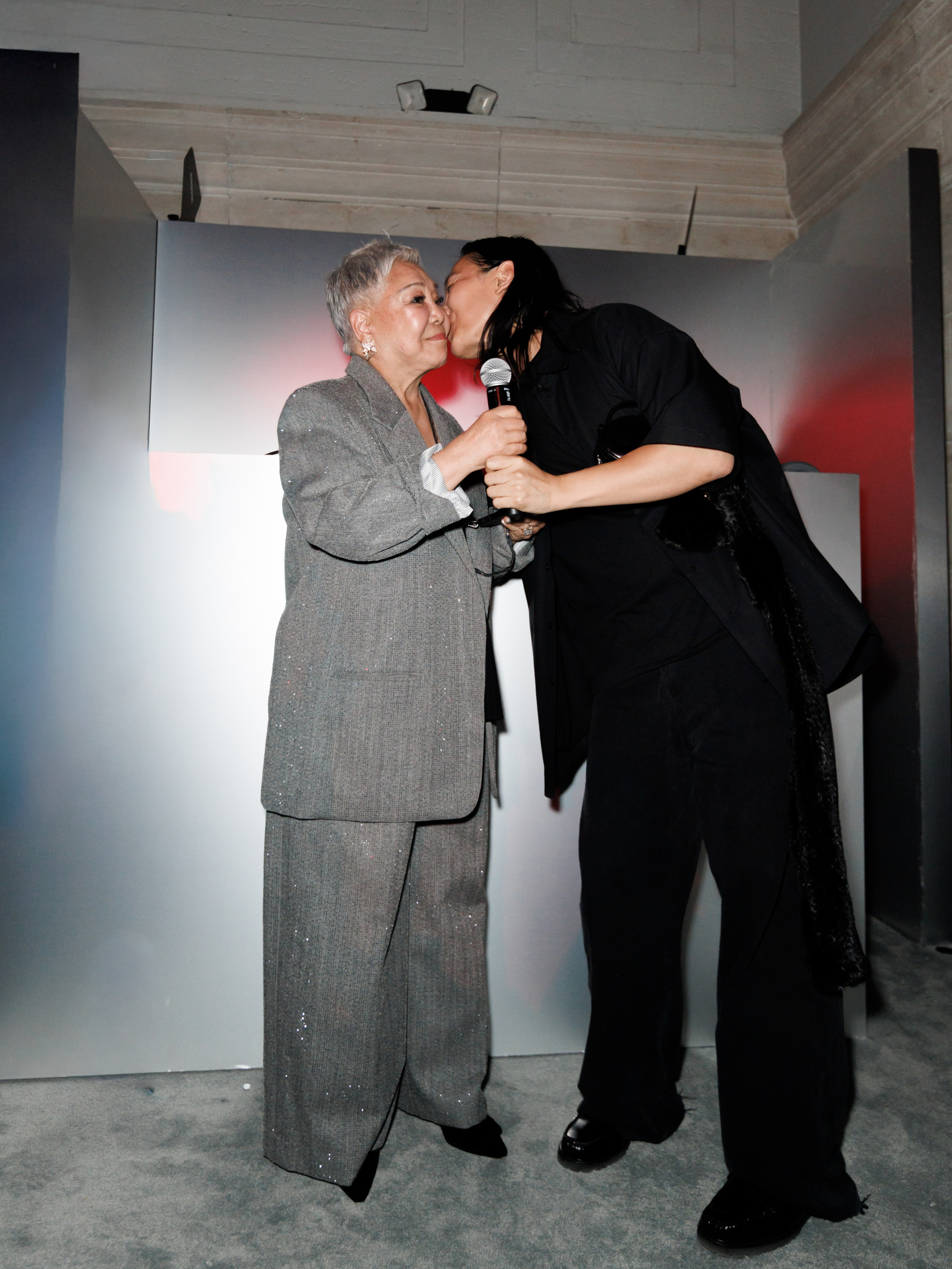 Guest in hoodie at evening event – candid portrait NYC