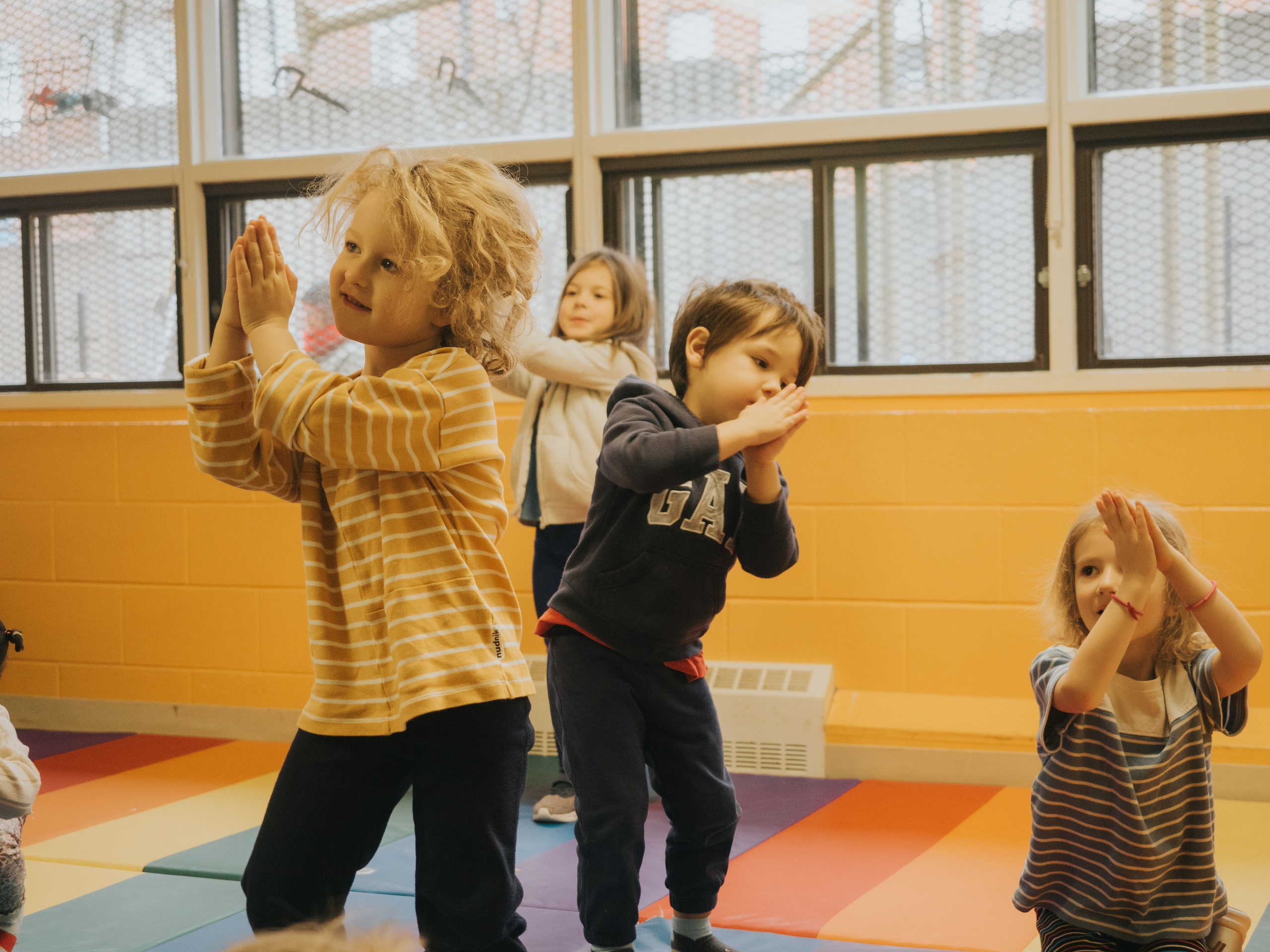 Photograph of a little girl dancing.