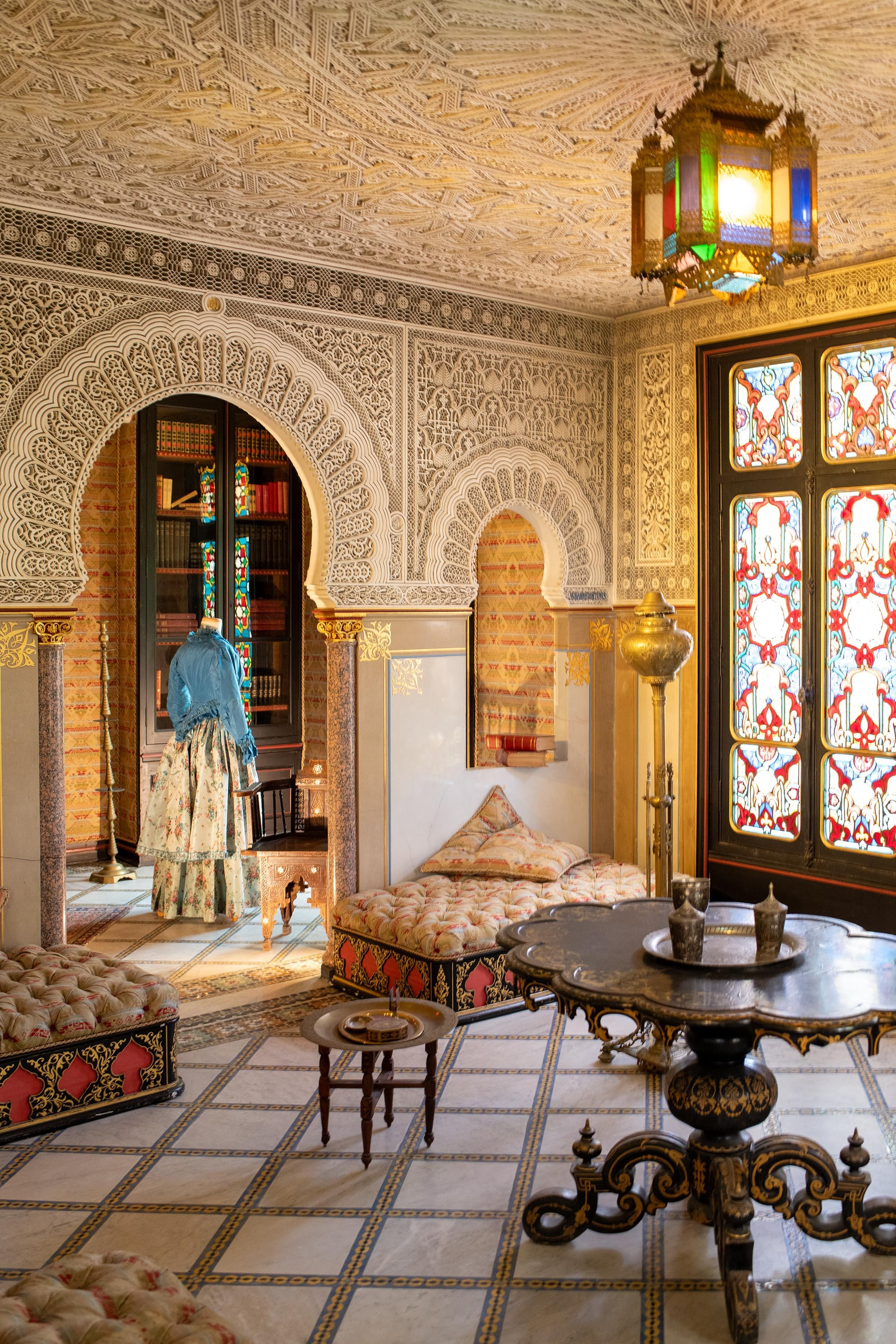 The Moorish Salon with ornate arches, stained-glass windows, and oriental décor inside the Château de Monte-Cristo