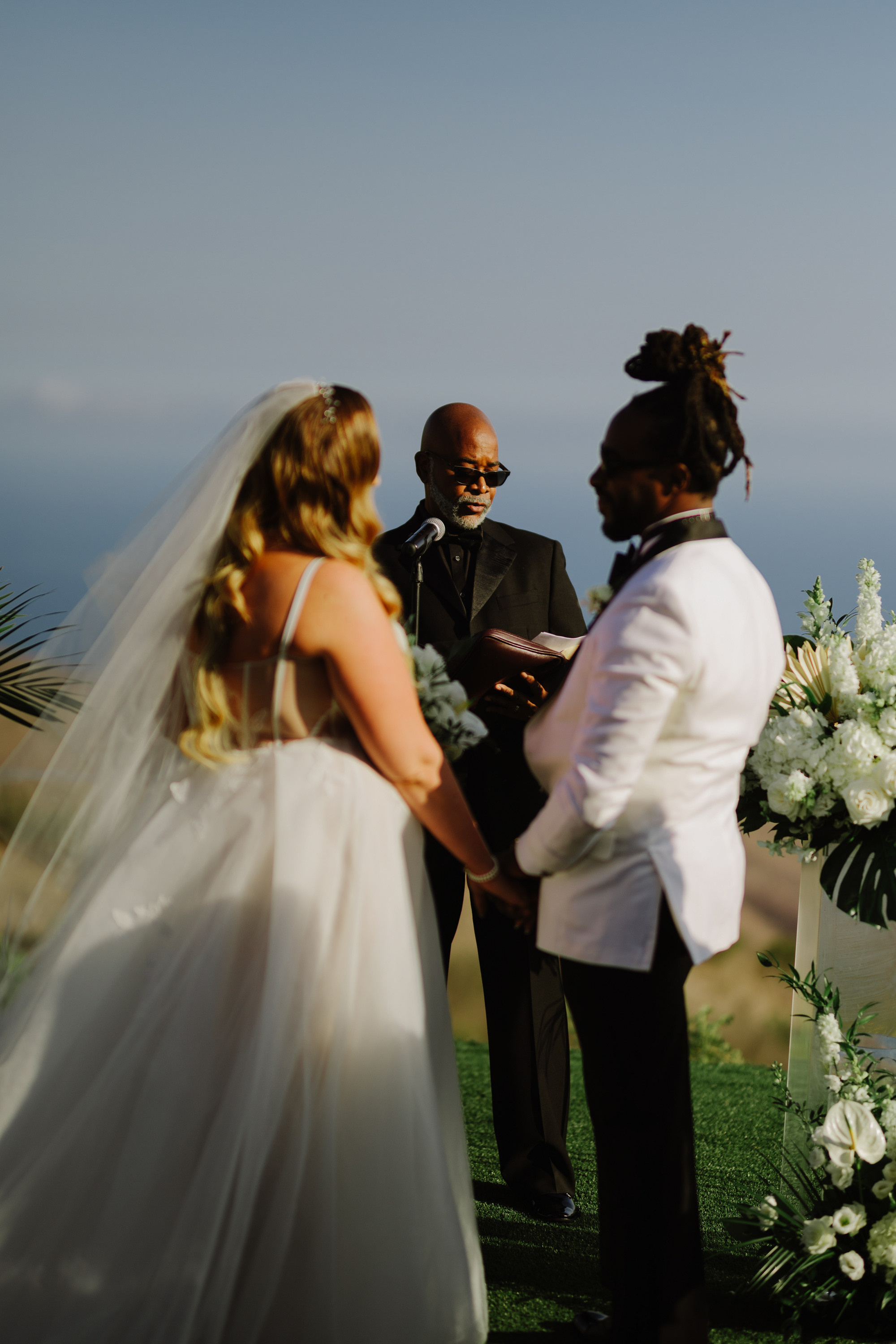 a man and woman standing next to each other people