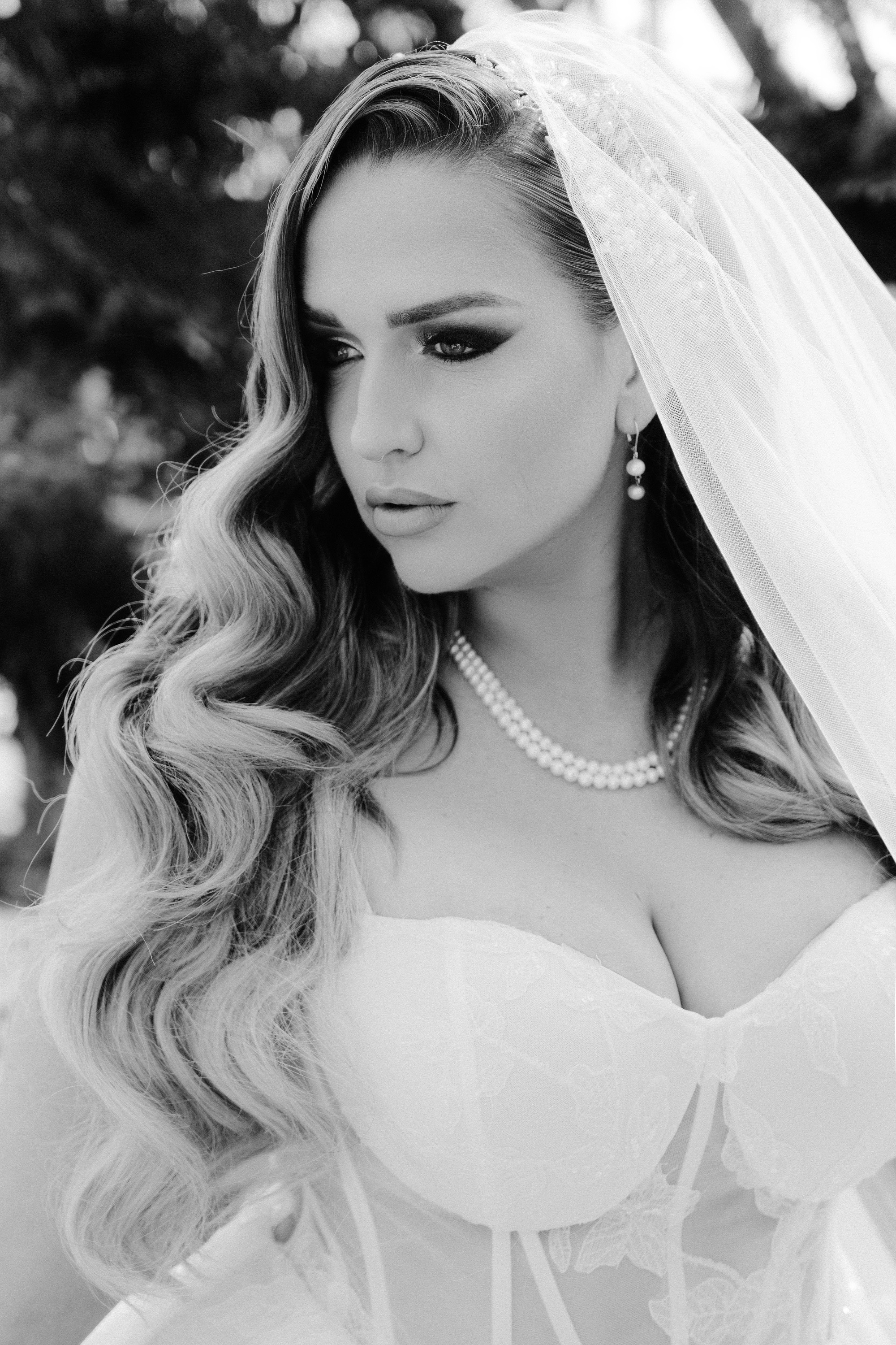 a woman in a wedding dress and veil