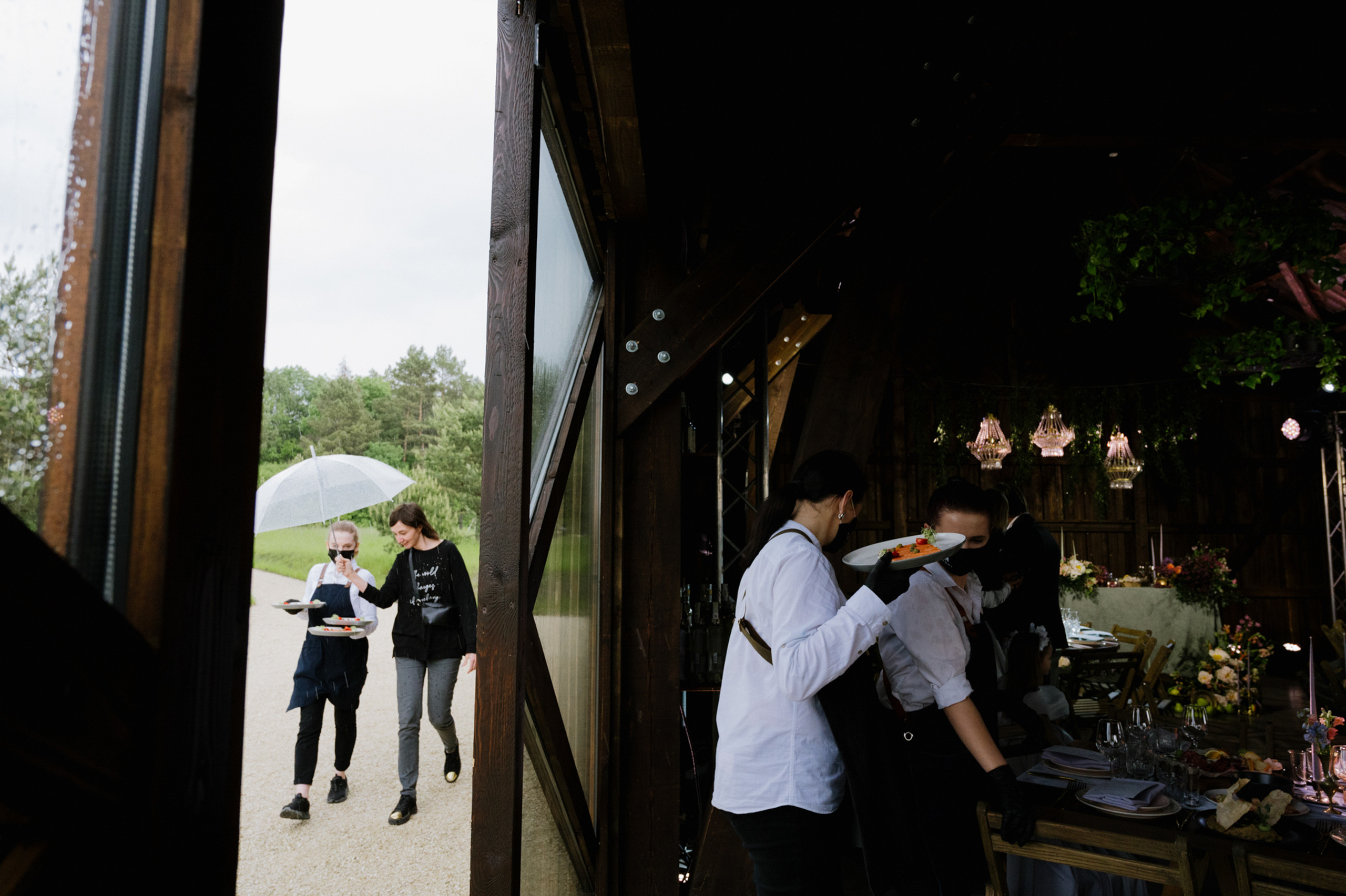 a group of people standing outside of a building