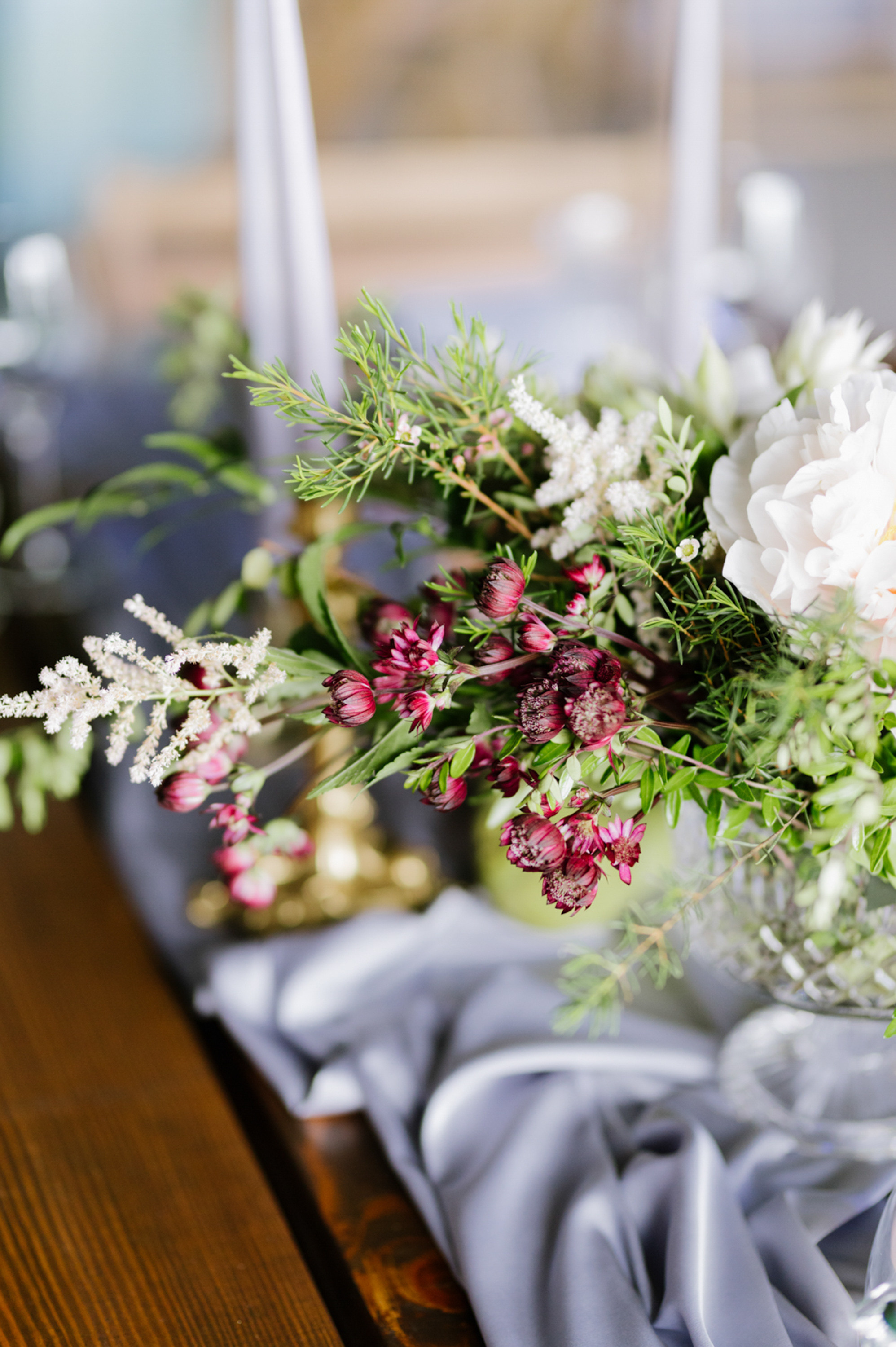 a table with a bunch of flowers on it