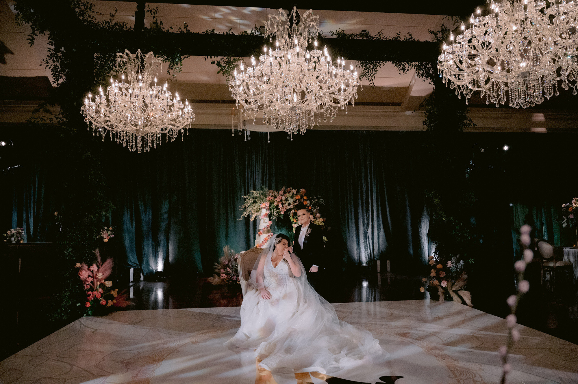 a bride and groom dancing on a dance floor