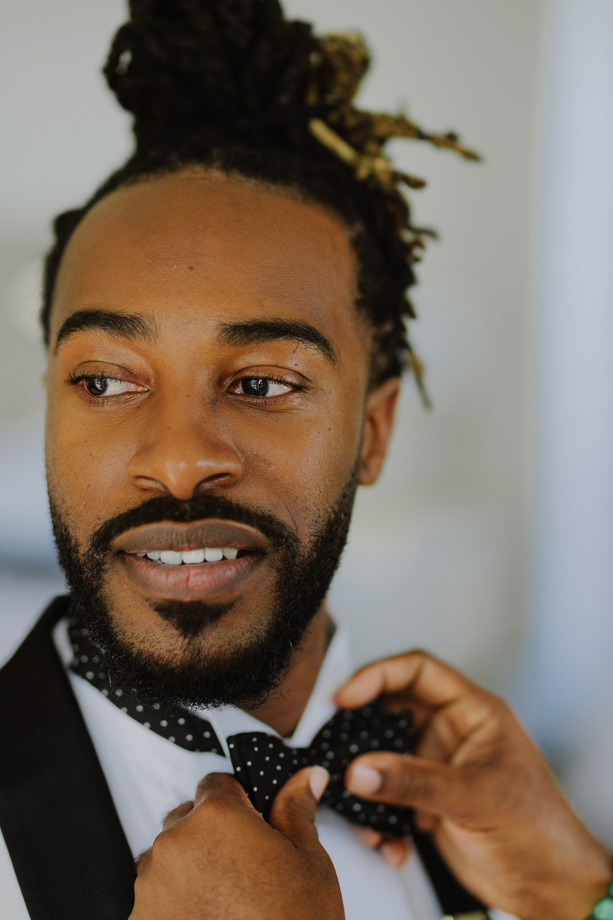 a man with a beard and a bow tie