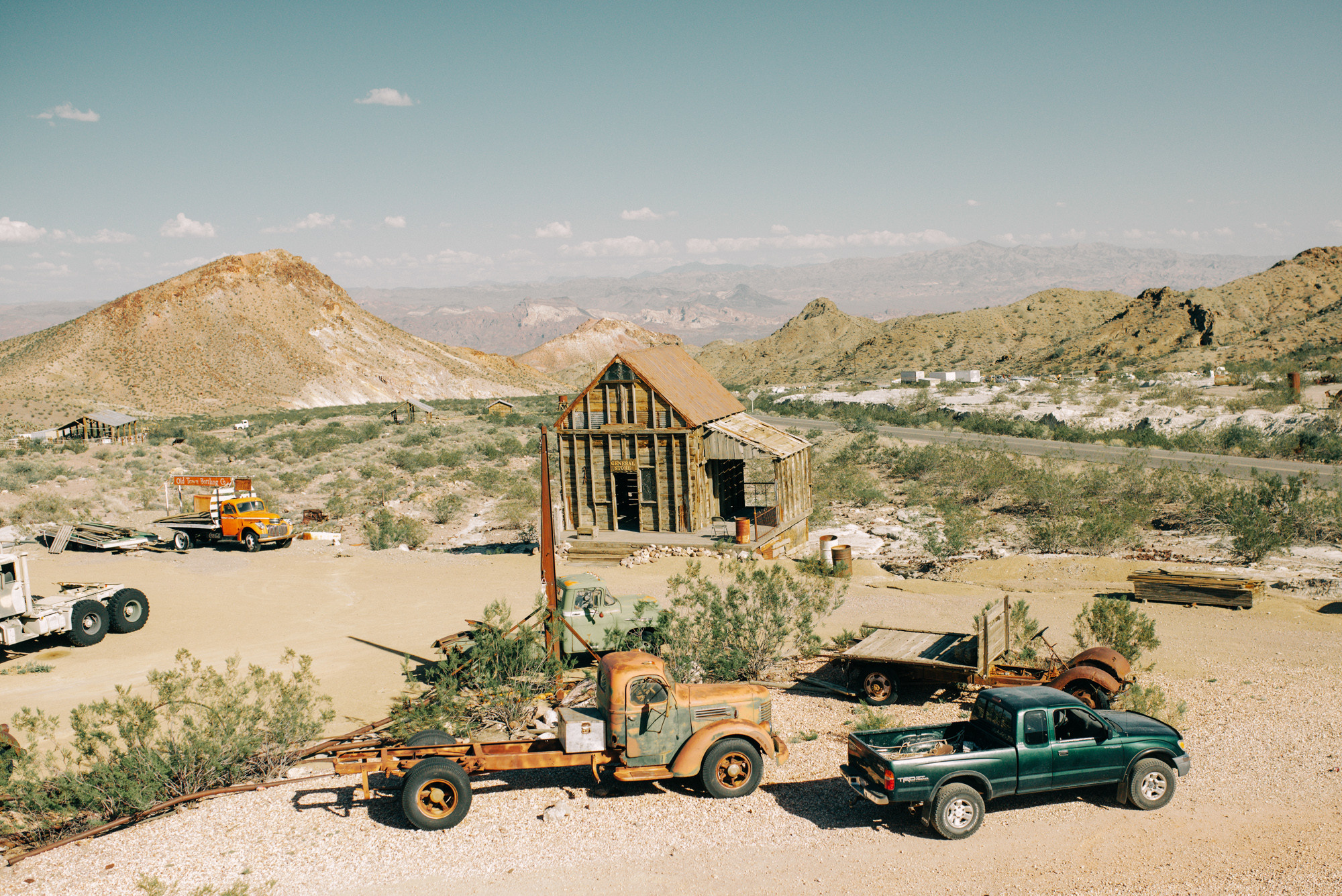a truck and a truck are parked in a lot