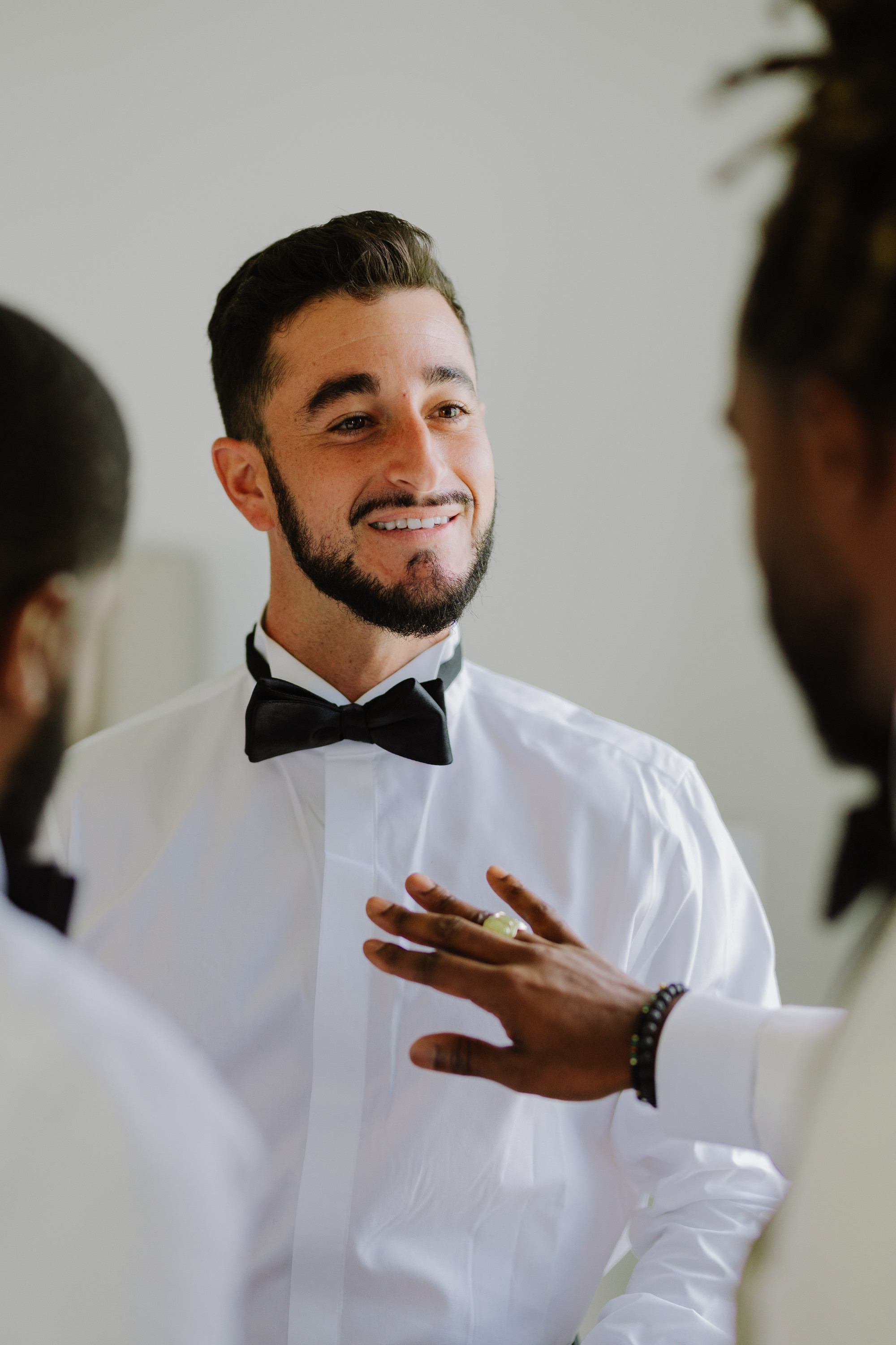 a man with a beard and a bow tie