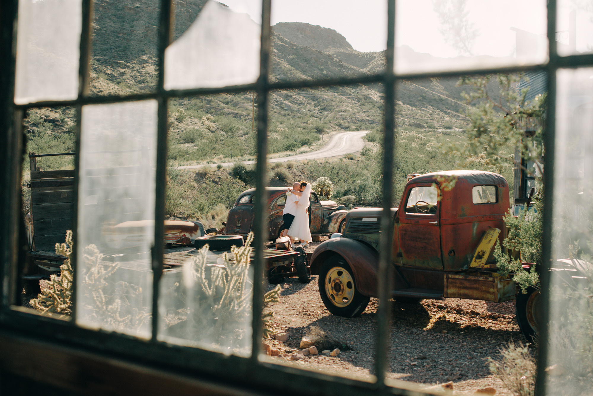 a man is standing next to a truck