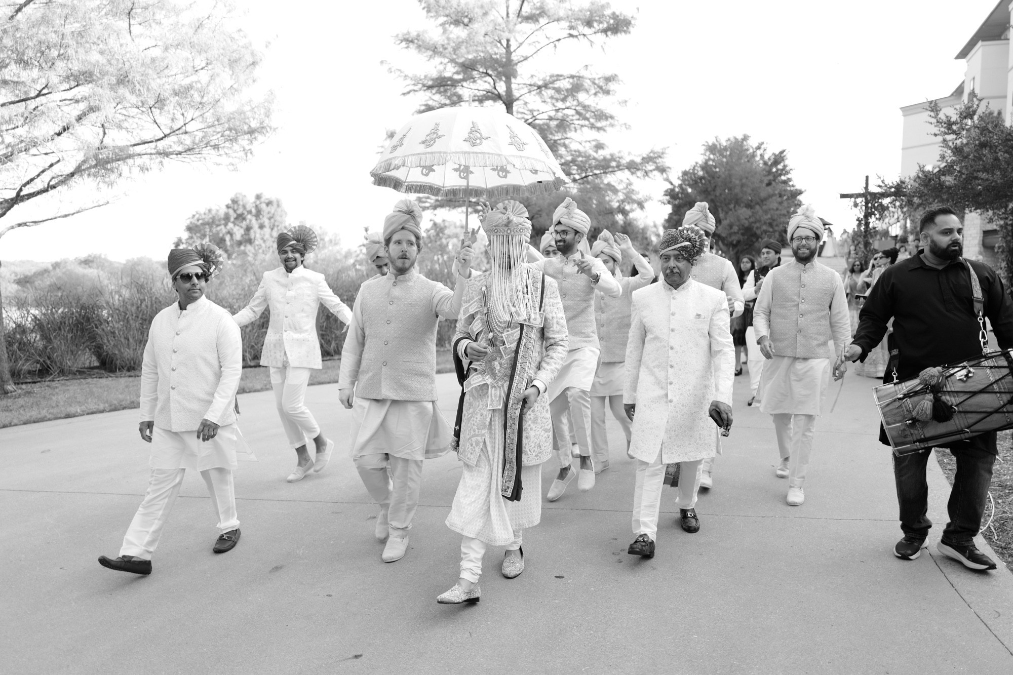 a group of people walking down a street