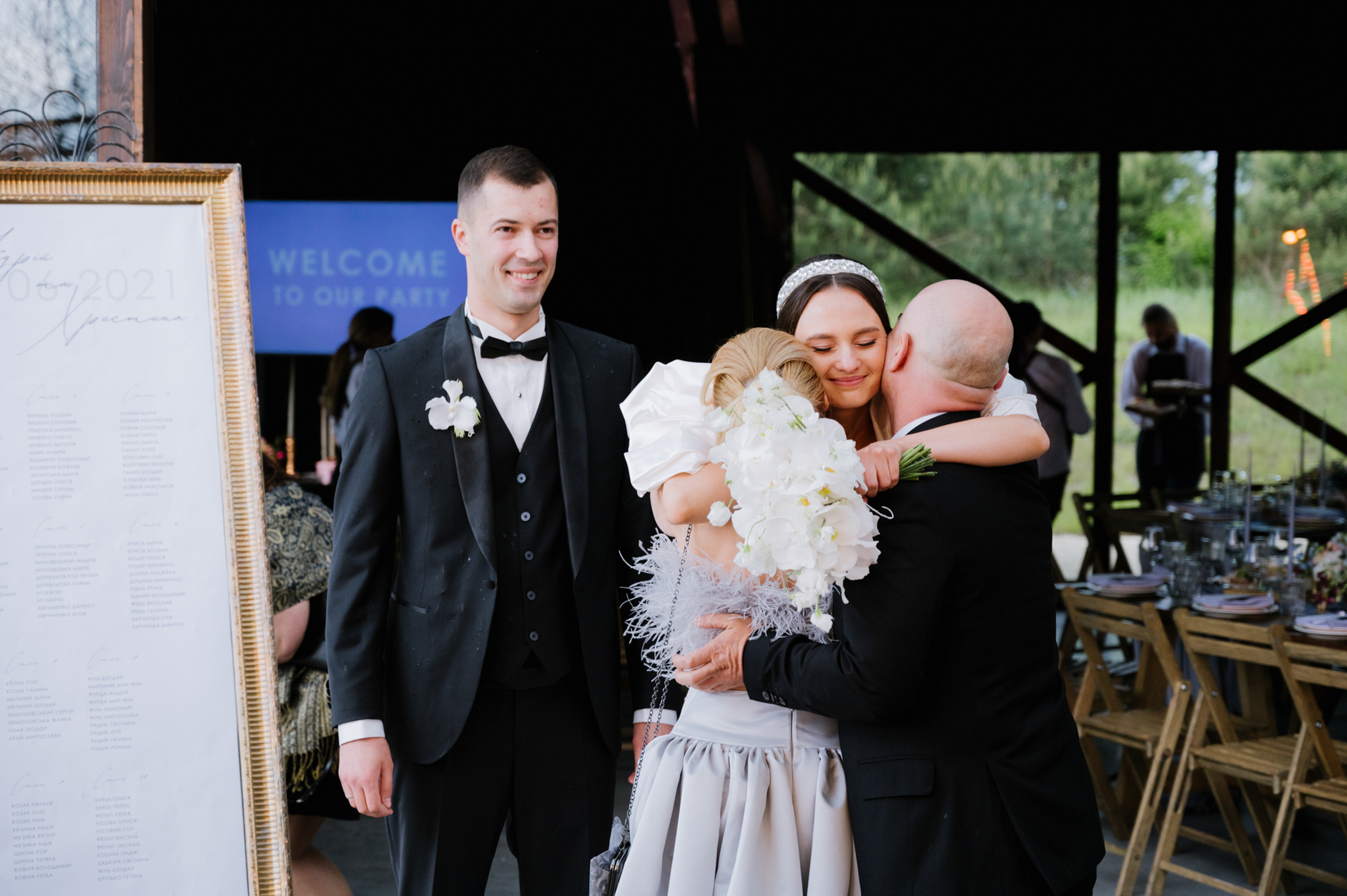 a man and woman are hugging each other people