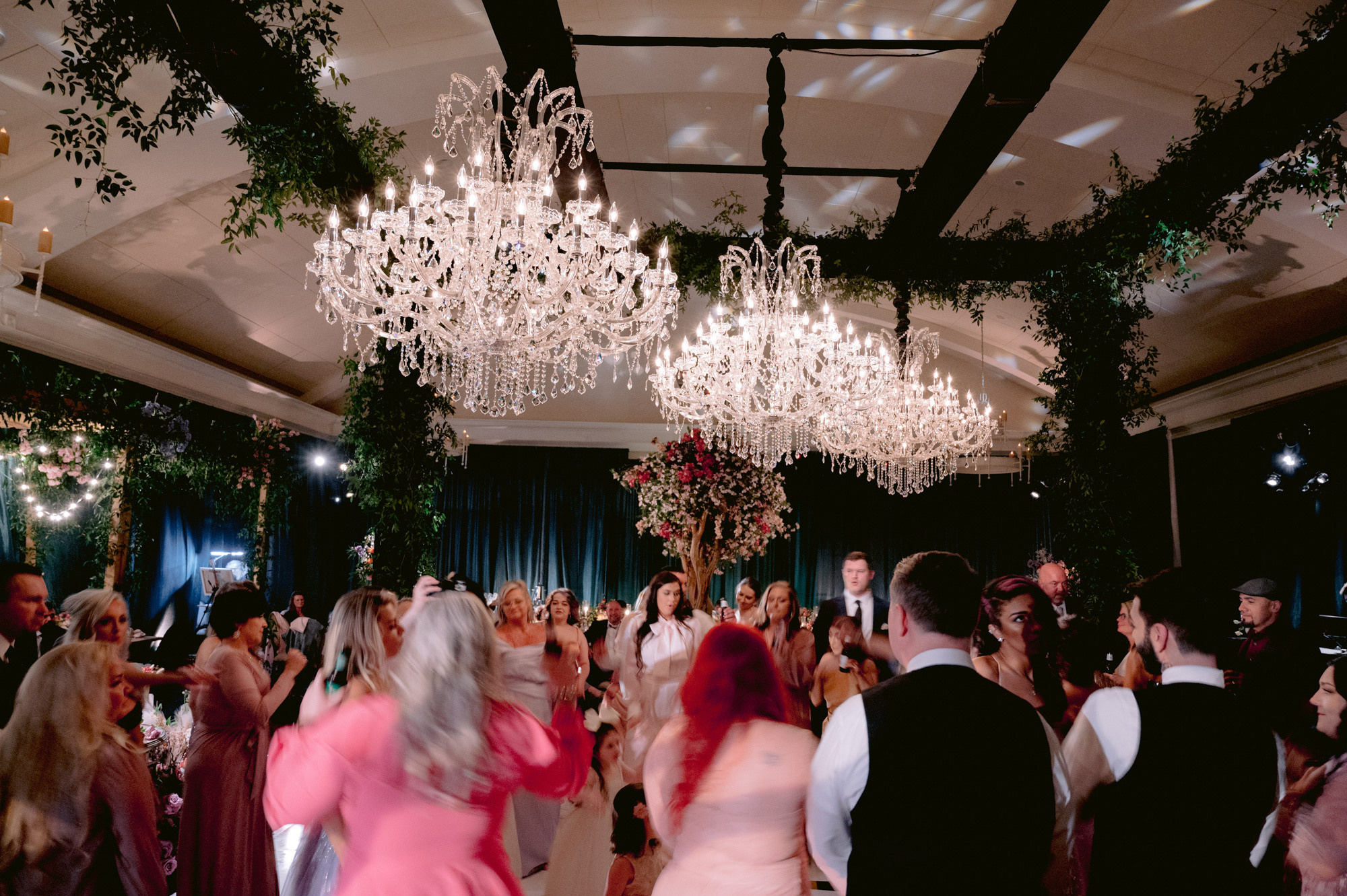a group of people dancing in a room