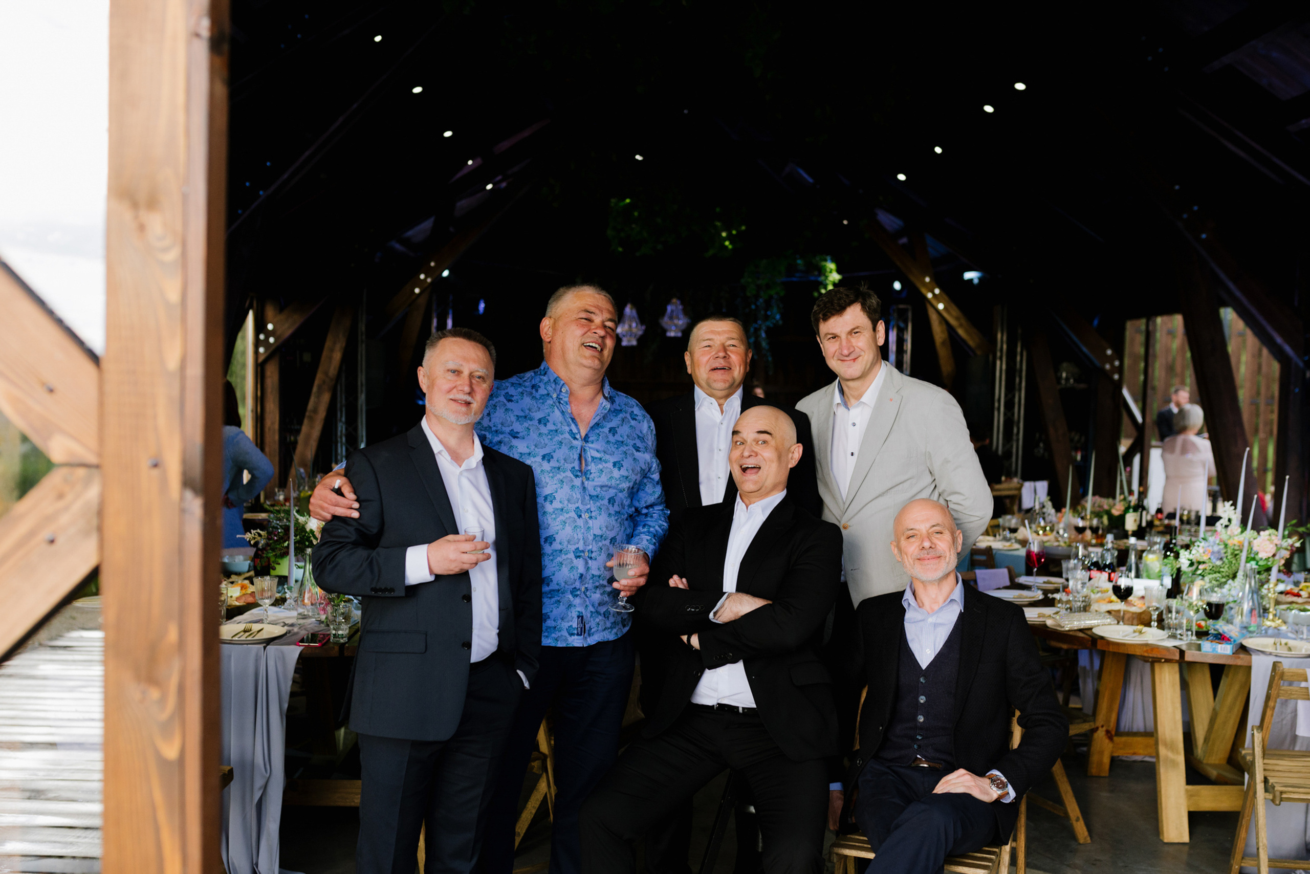 a group of men posing for a picture