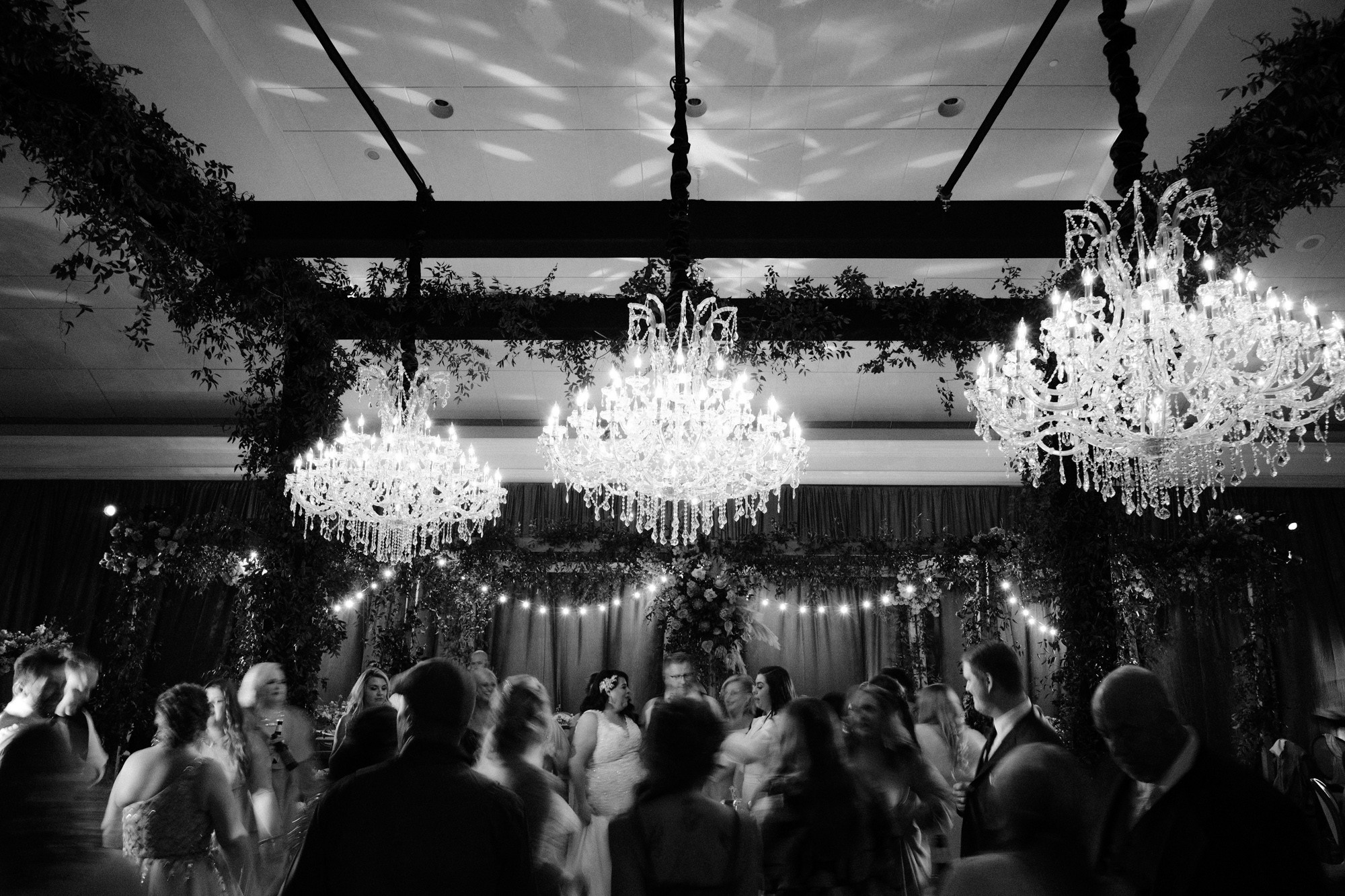 a black and white photo of a wedding party