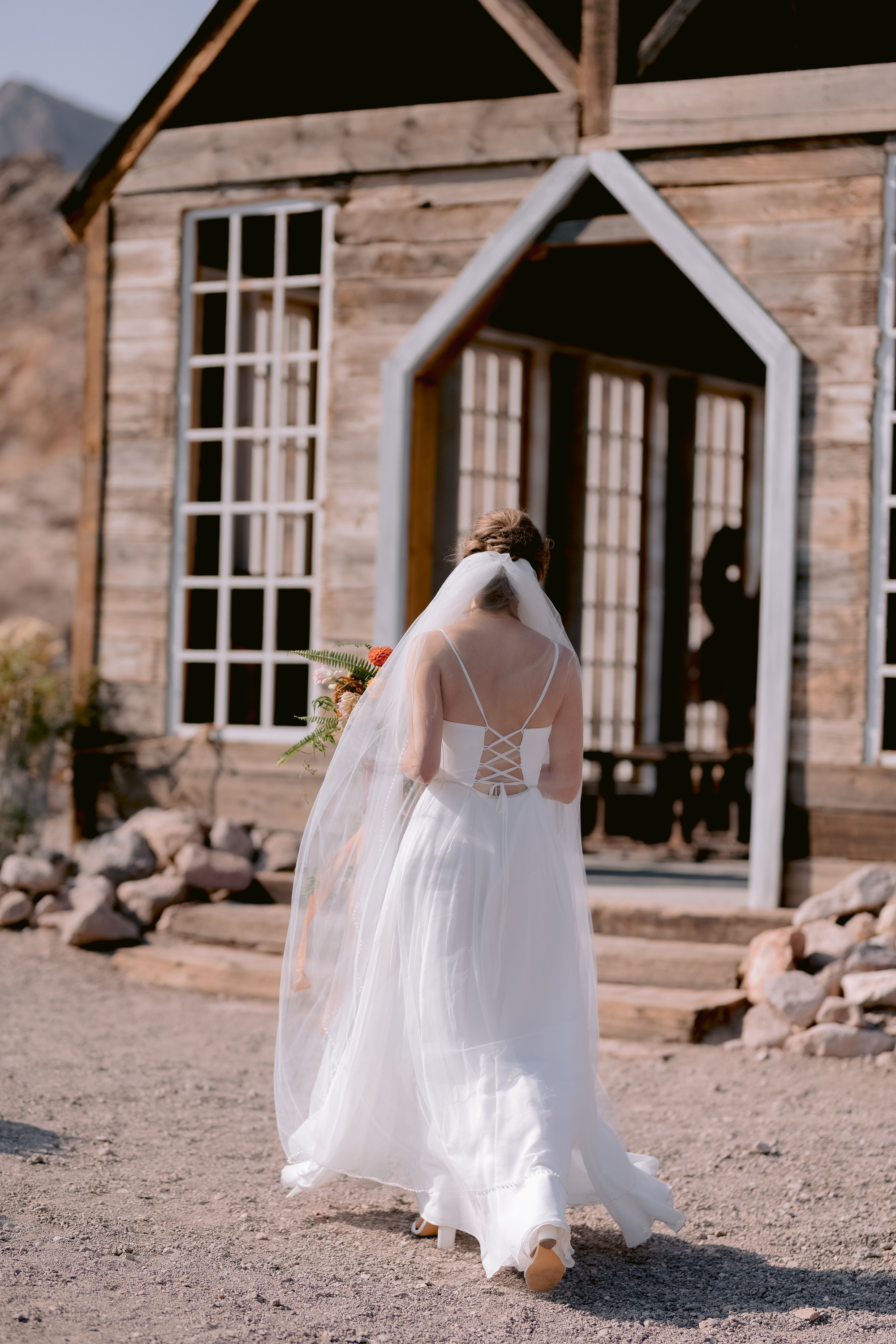 a bride walking towards the camera