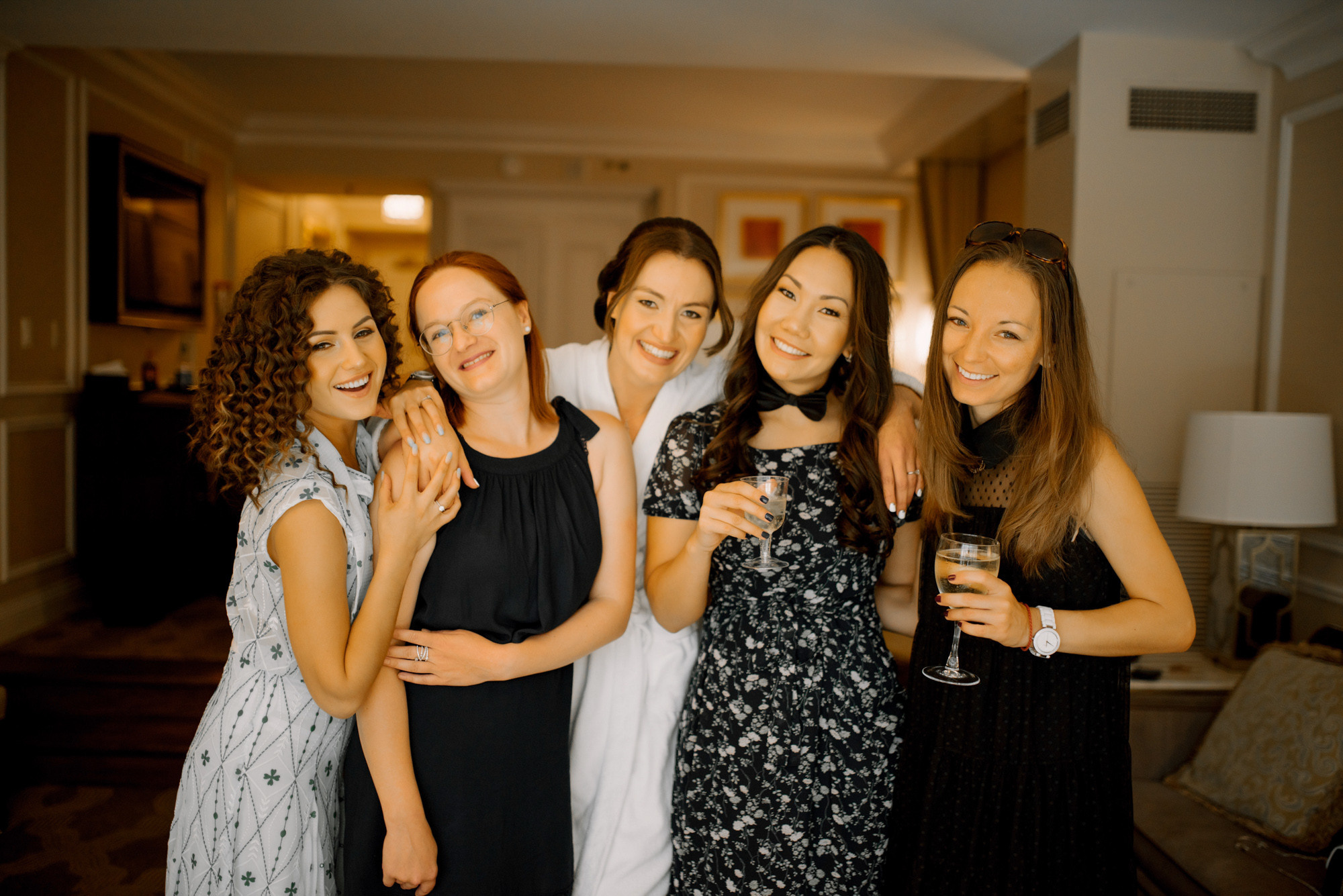 a group of women standing next to each other women