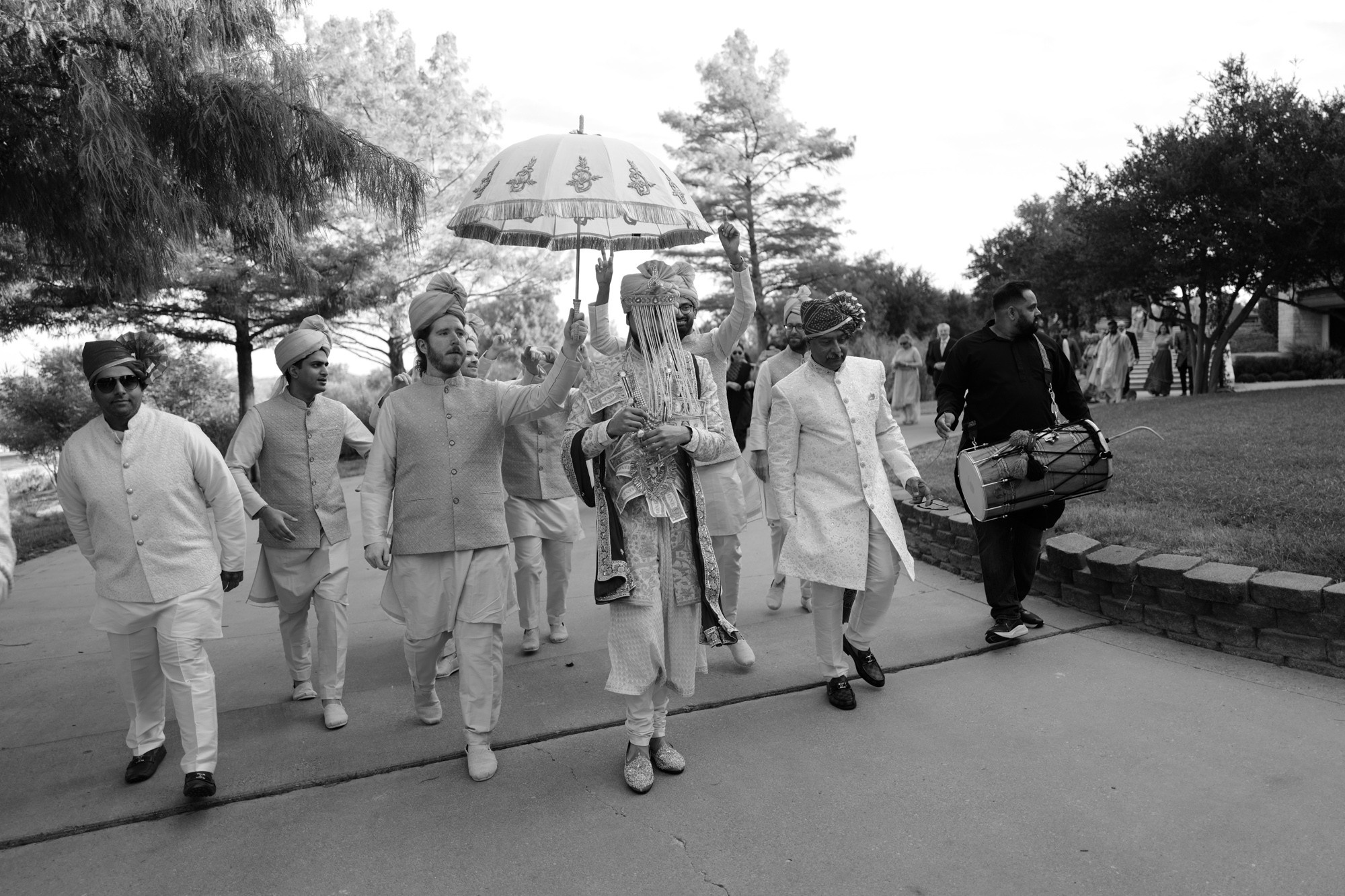 a group of people walking down a street